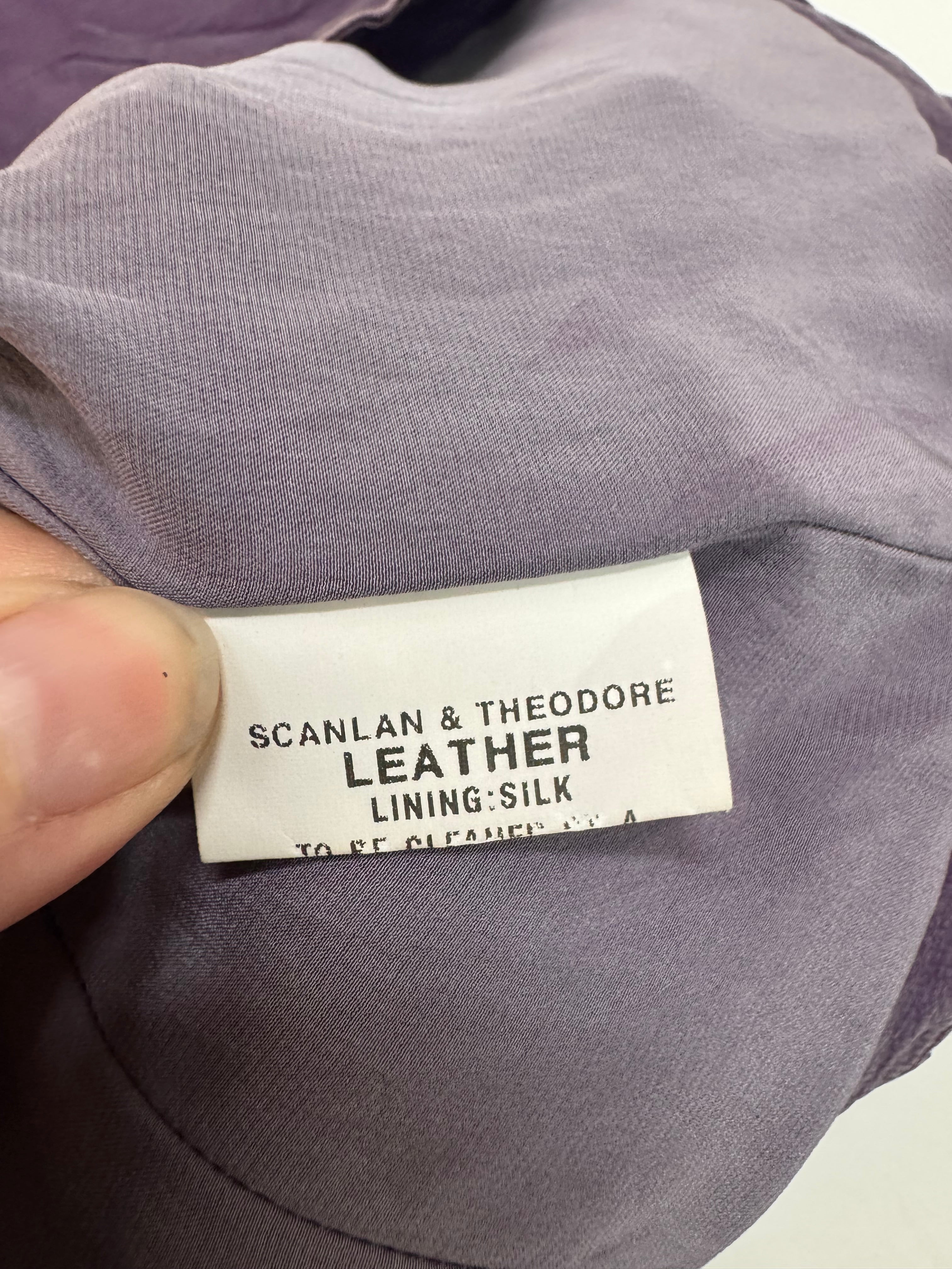 Close-up of a clothing label on a garment with visible text.