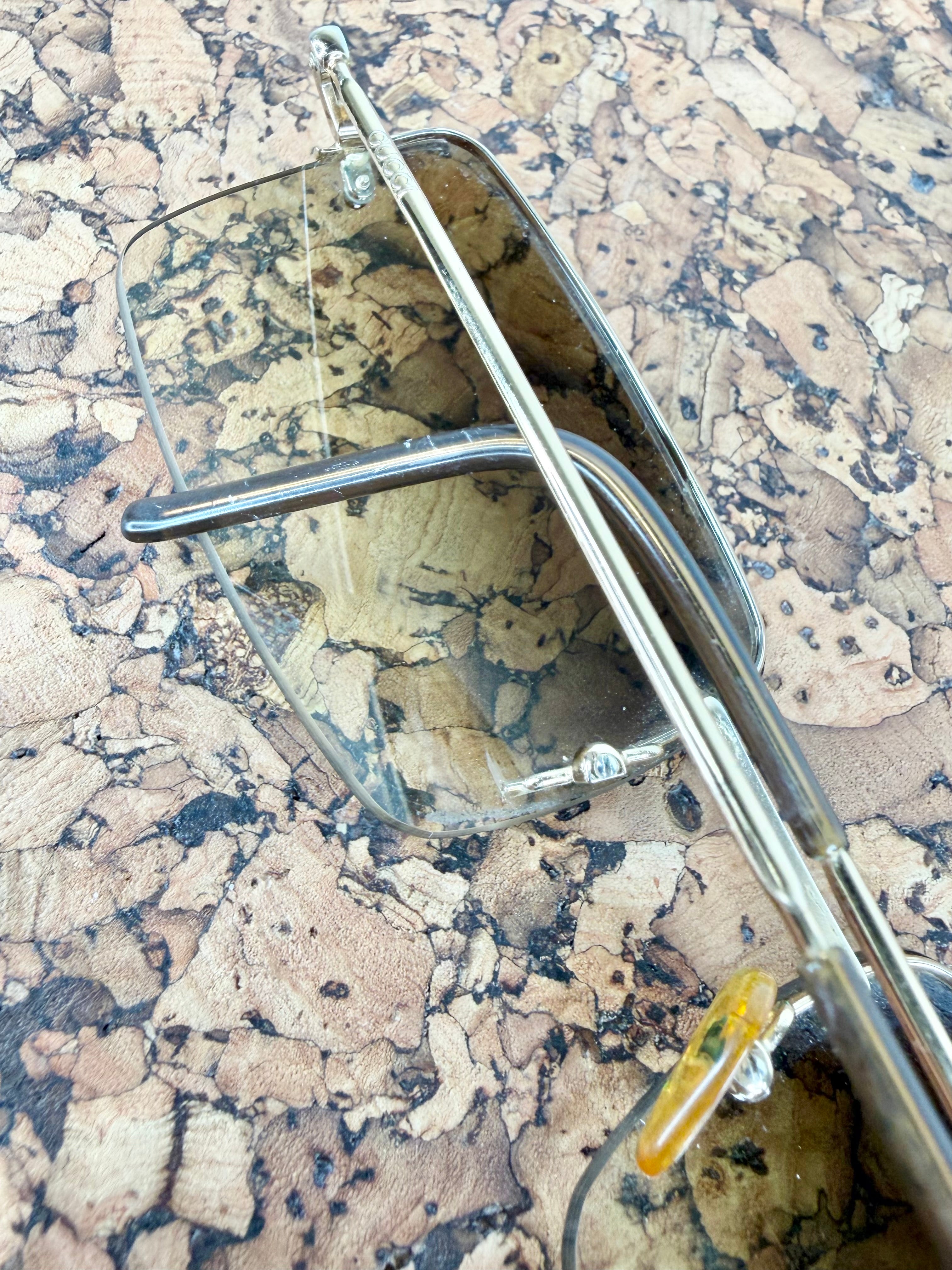 Gucci GG1653/S Gold Rimless Sunglasses