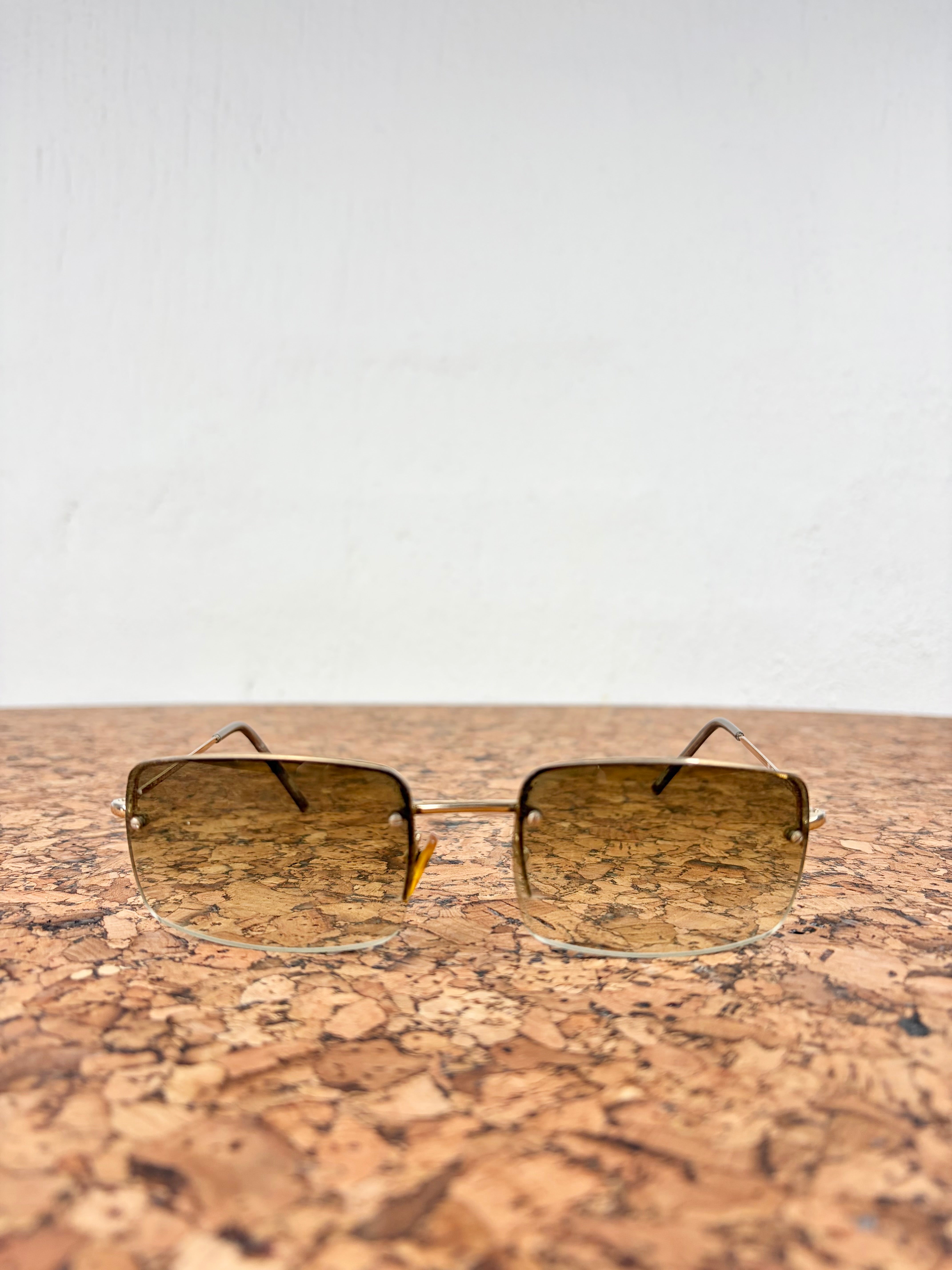 Gucci GG1653/S Gold Rimless Sunglasses