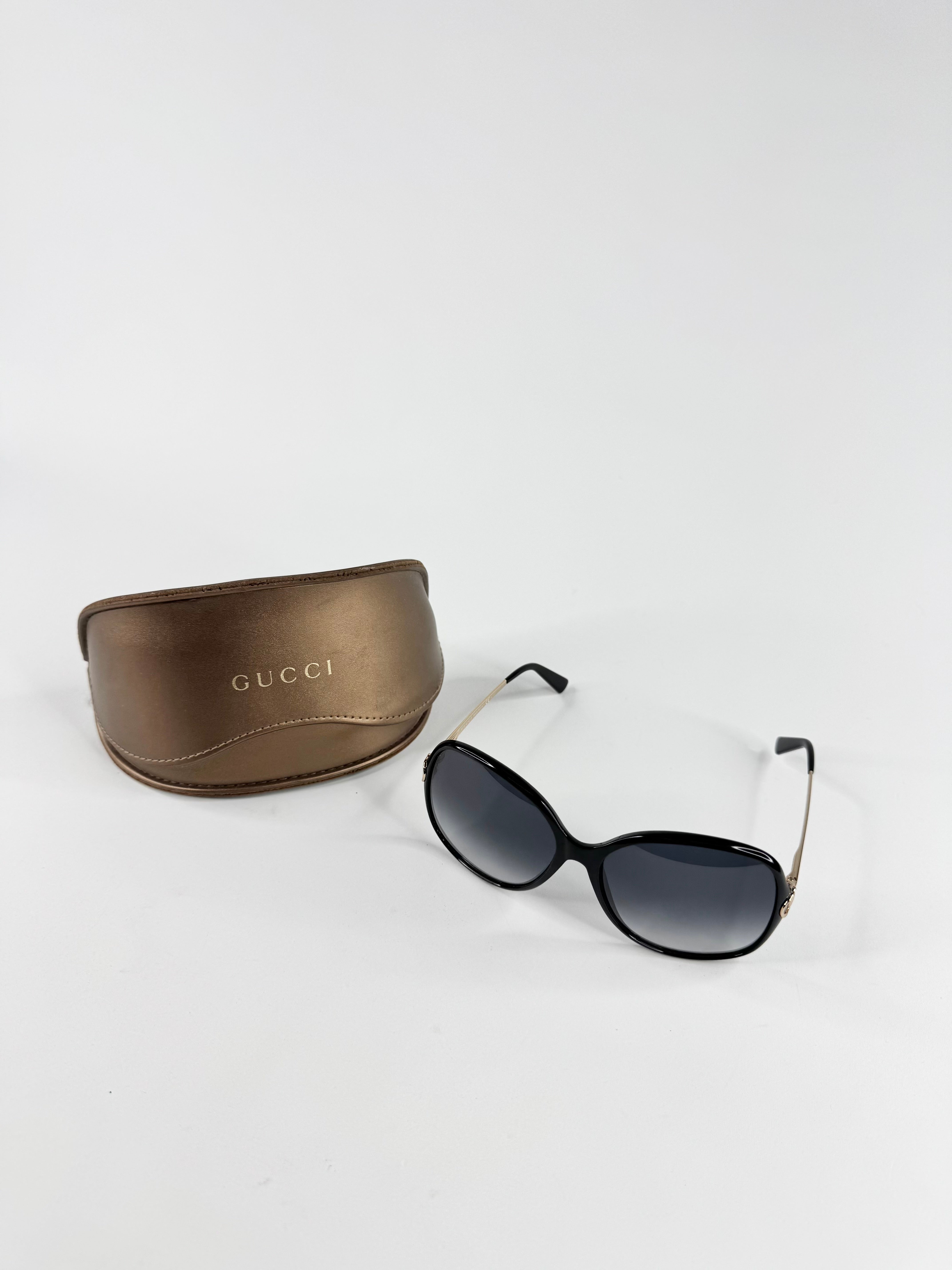 Gucci Black and Gold Round Sunglasses