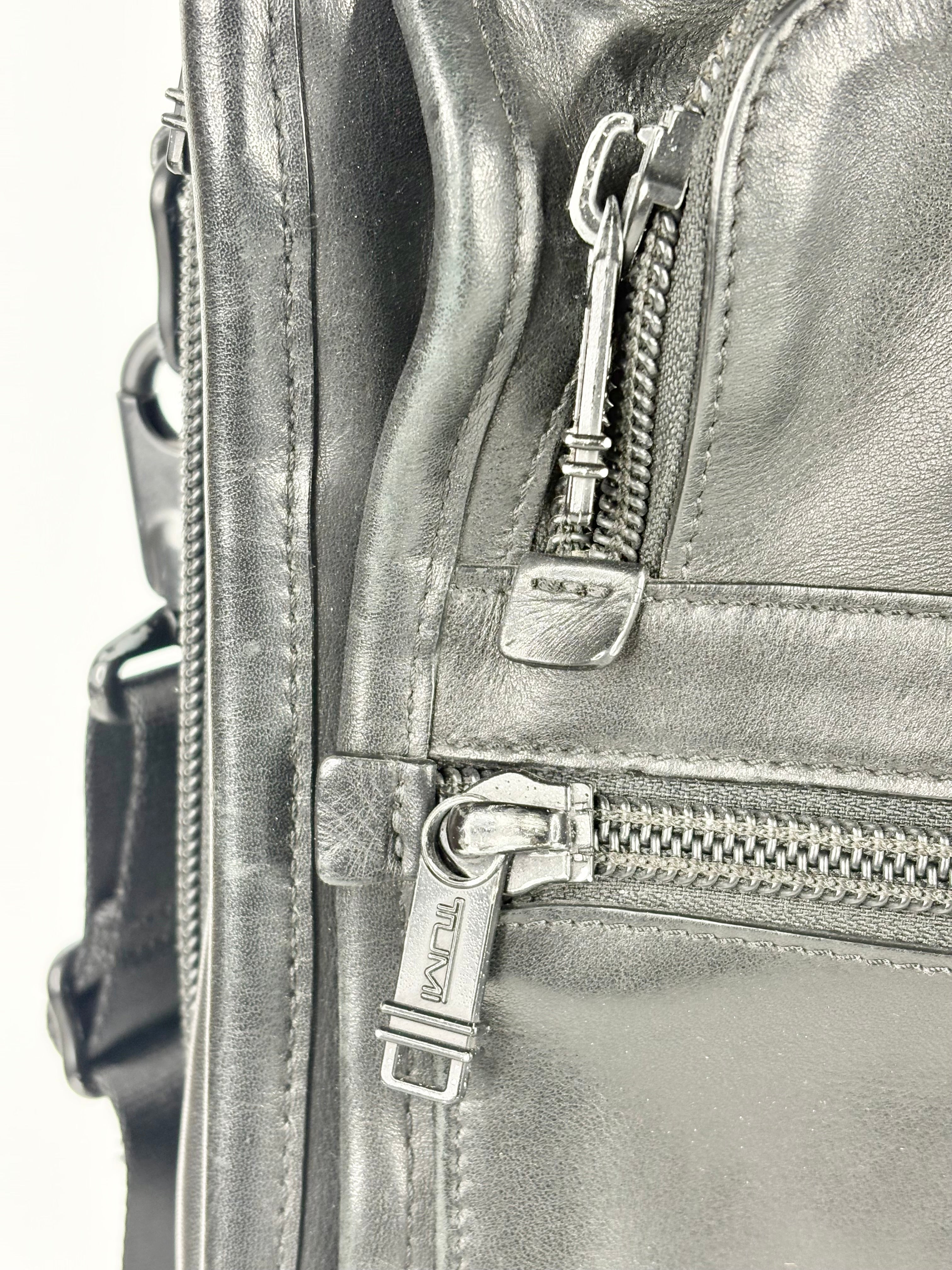 Tumi Black Leather Accordion-Style Messenger Briefcase