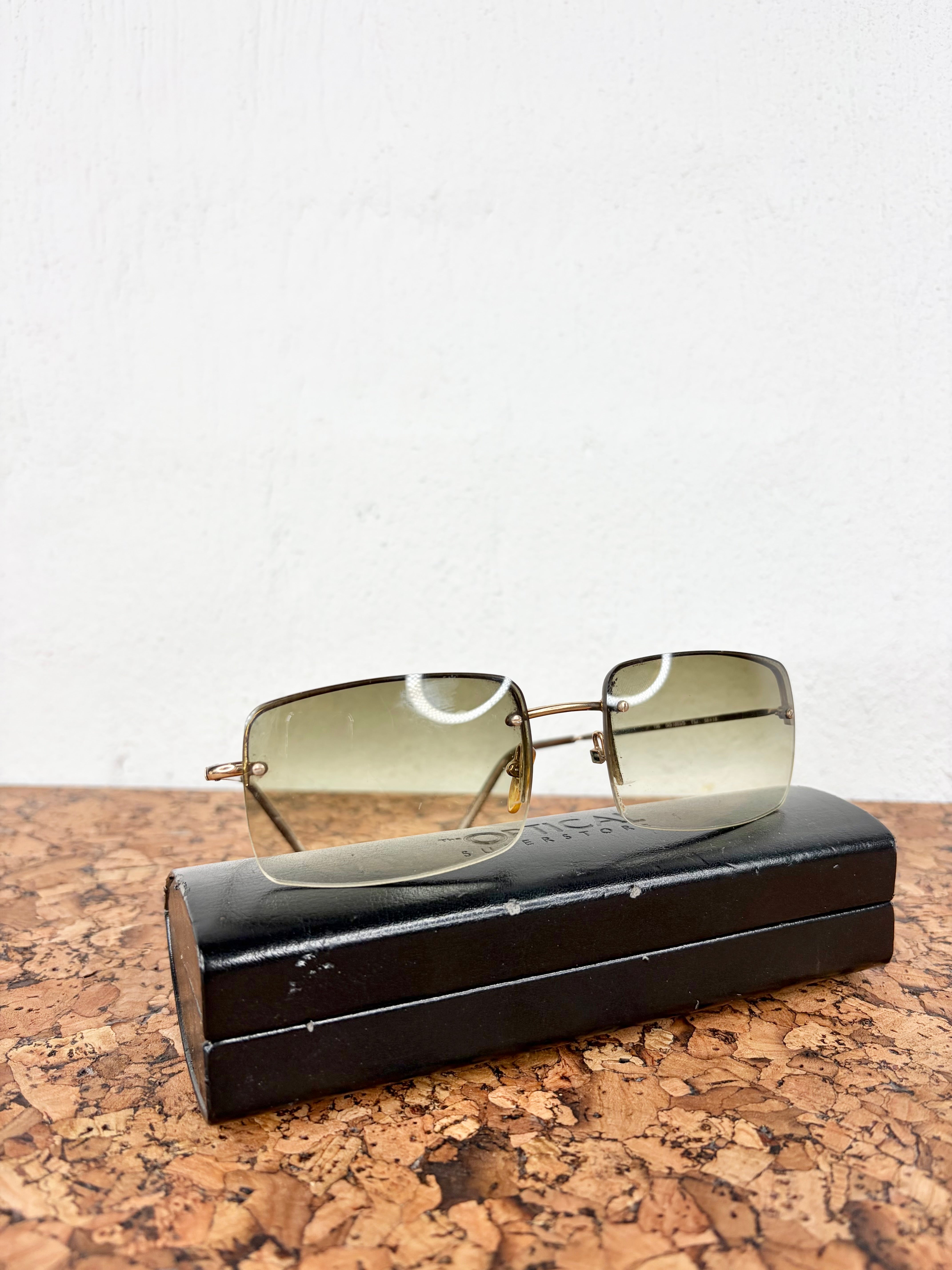 Gucci GG1653/S Gold Rimless Sunglasses