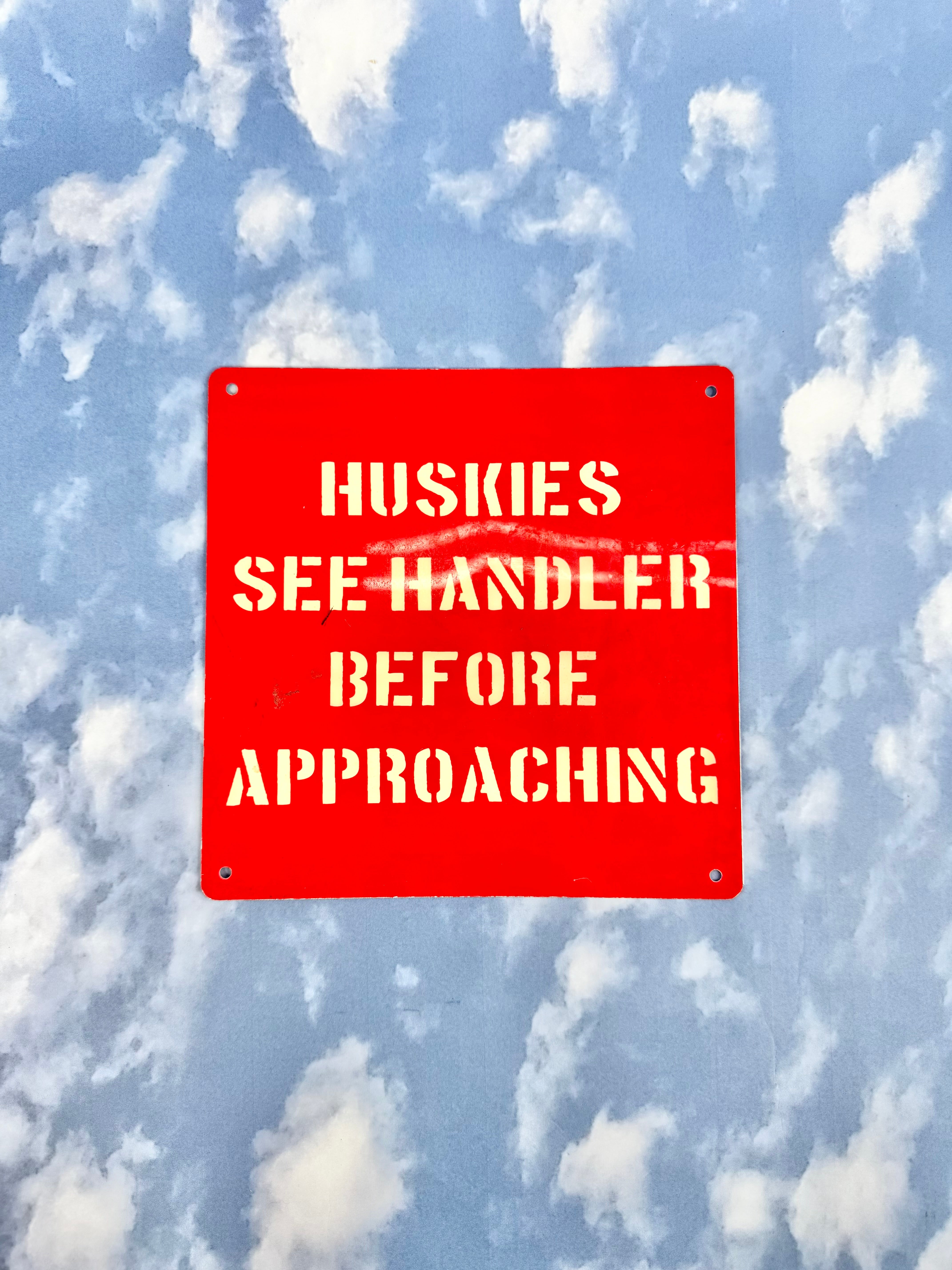 Huskies See Handler Before Approaching Red Sign