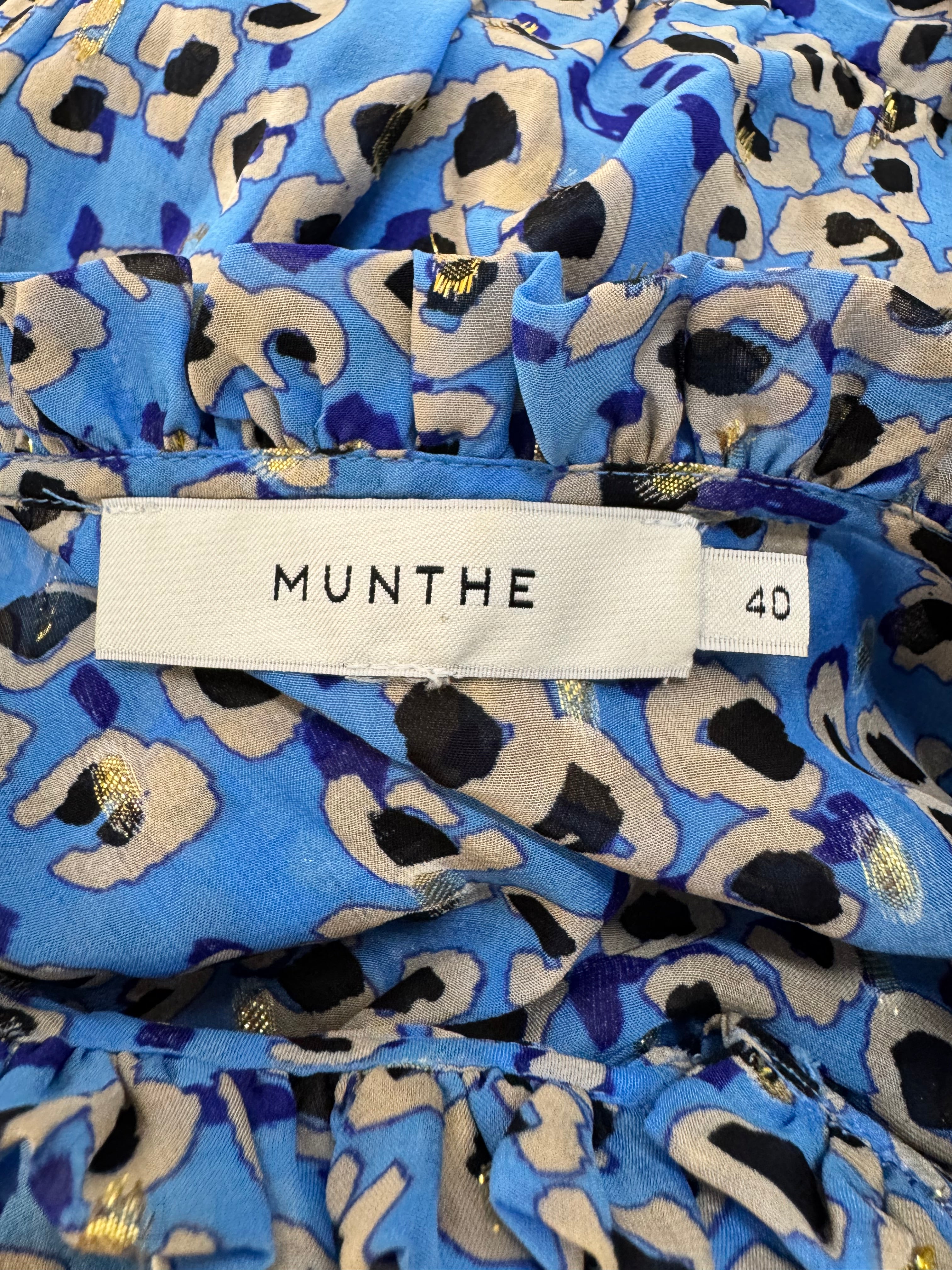 Blue fabric with black and beige pattern and a visible 'Munthe' label.