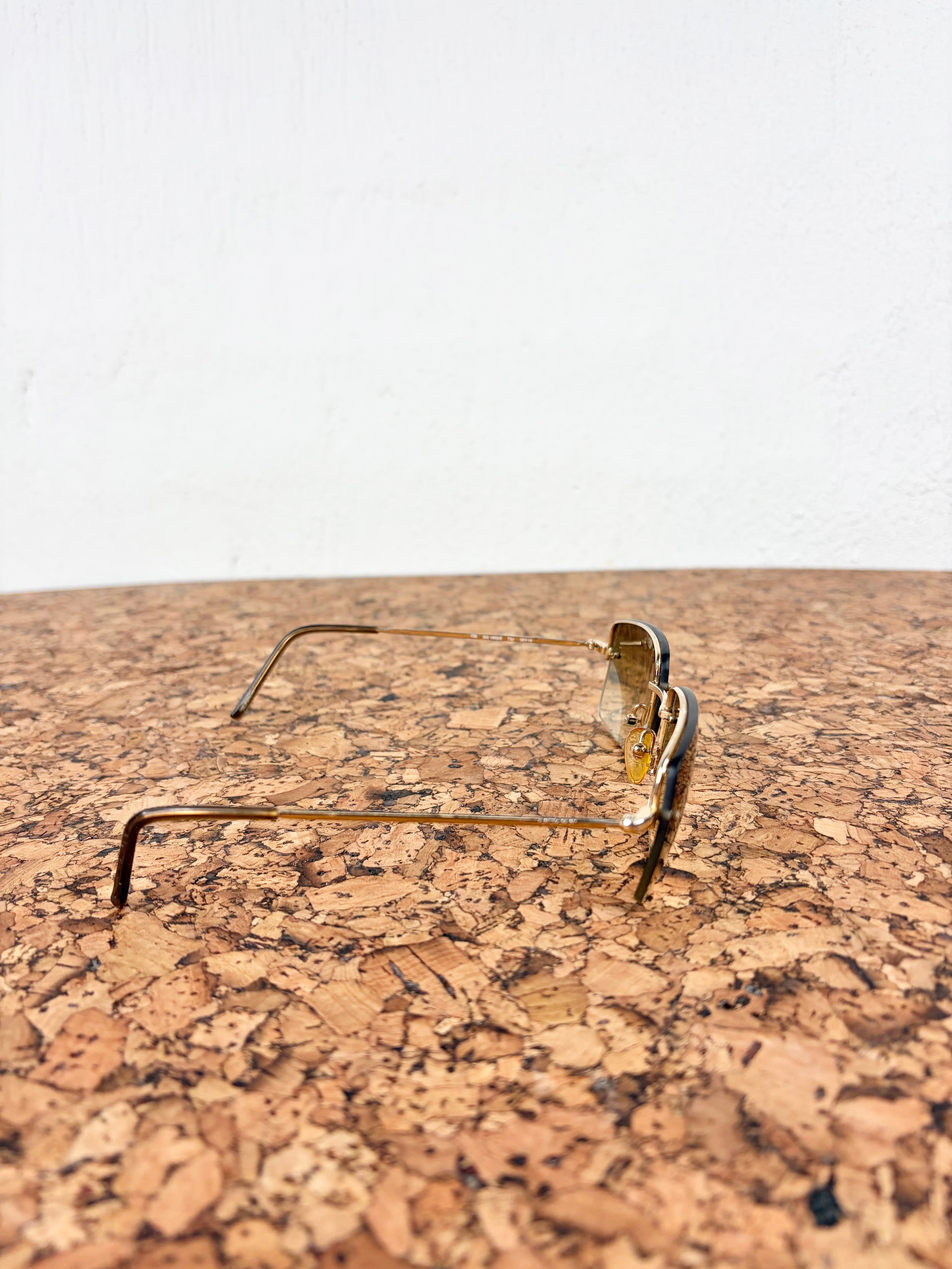 Gucci GG1653/S Gold Rimless Sunglasses