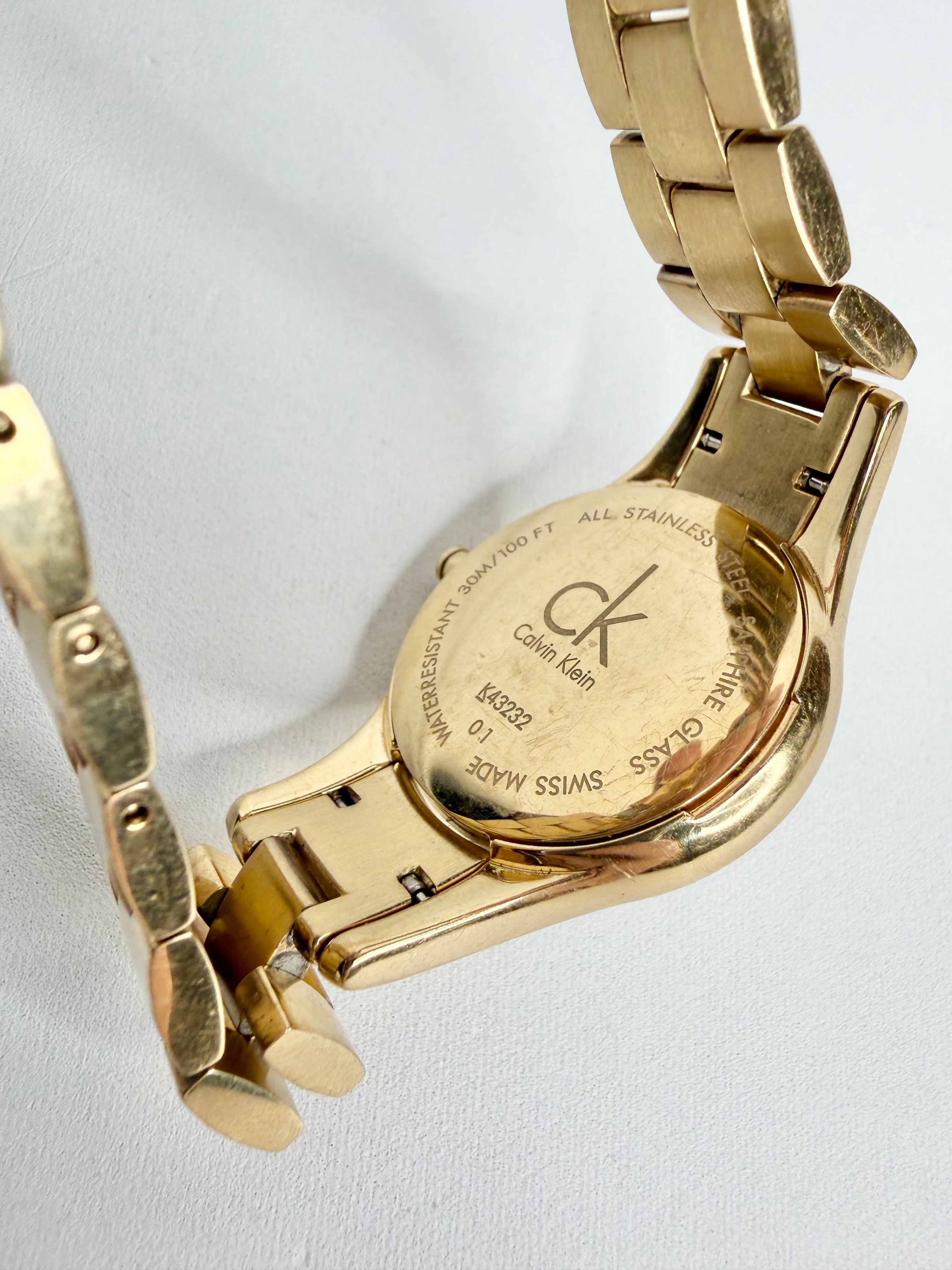 Calvin Klein K43232 Swiss Made Crystal Gold Tone Sapphire Watch
