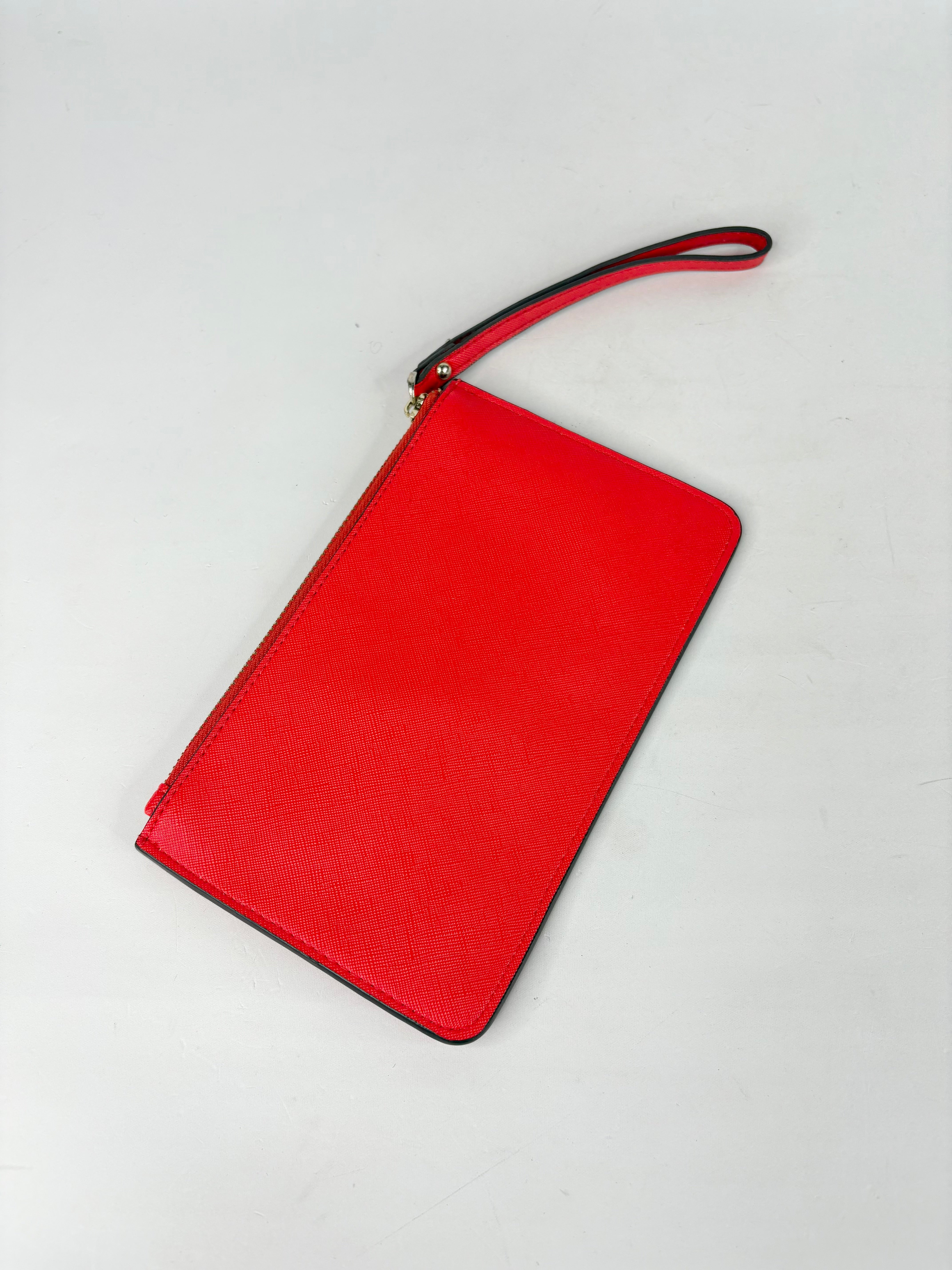 Kate Spade Coral Leather Wristlet Pouch