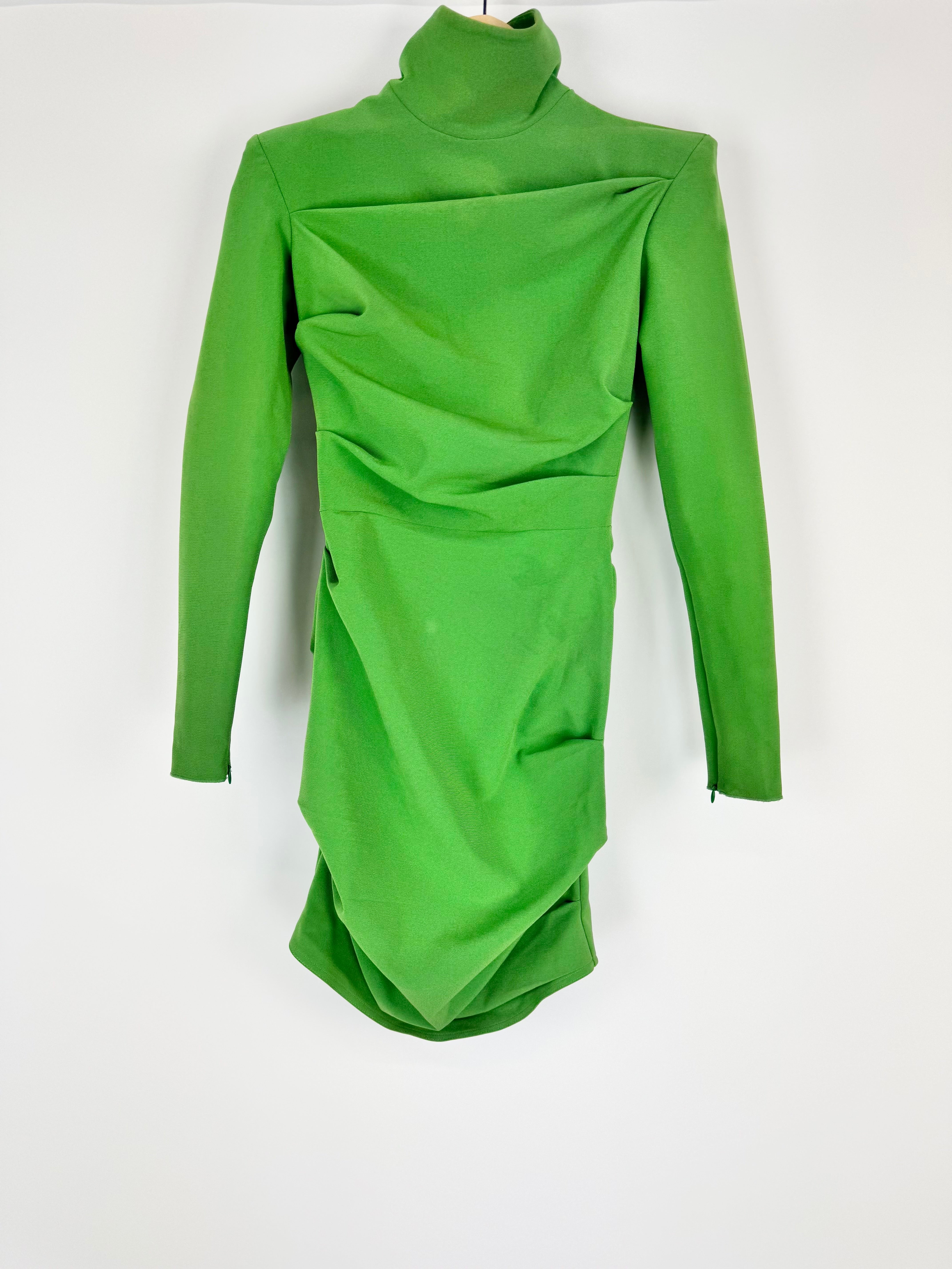Green dress with long sleeves on a white background