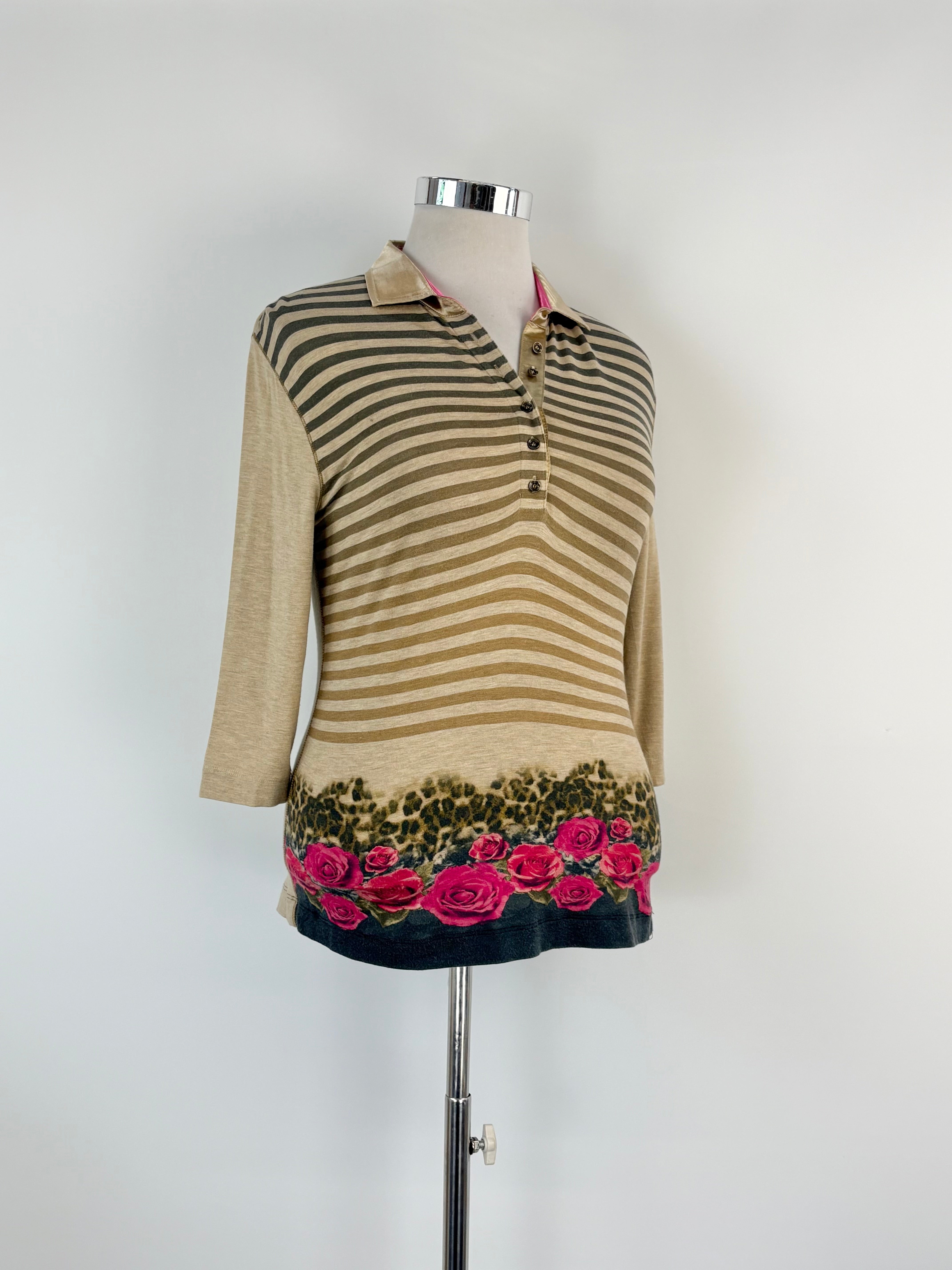 Striped long sleeve polo with floral design on a mannequin against a white background