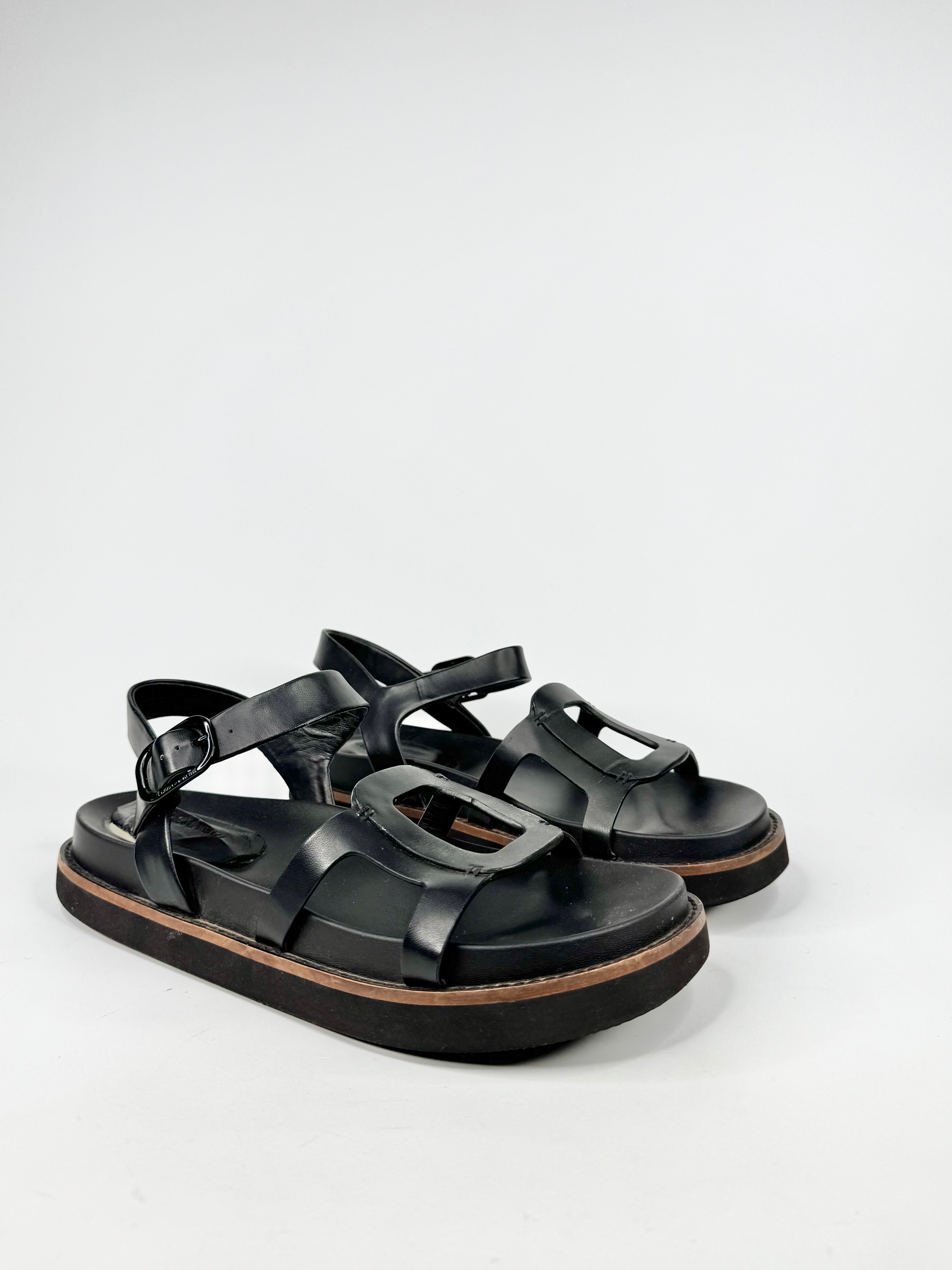 Black sandals on a white background