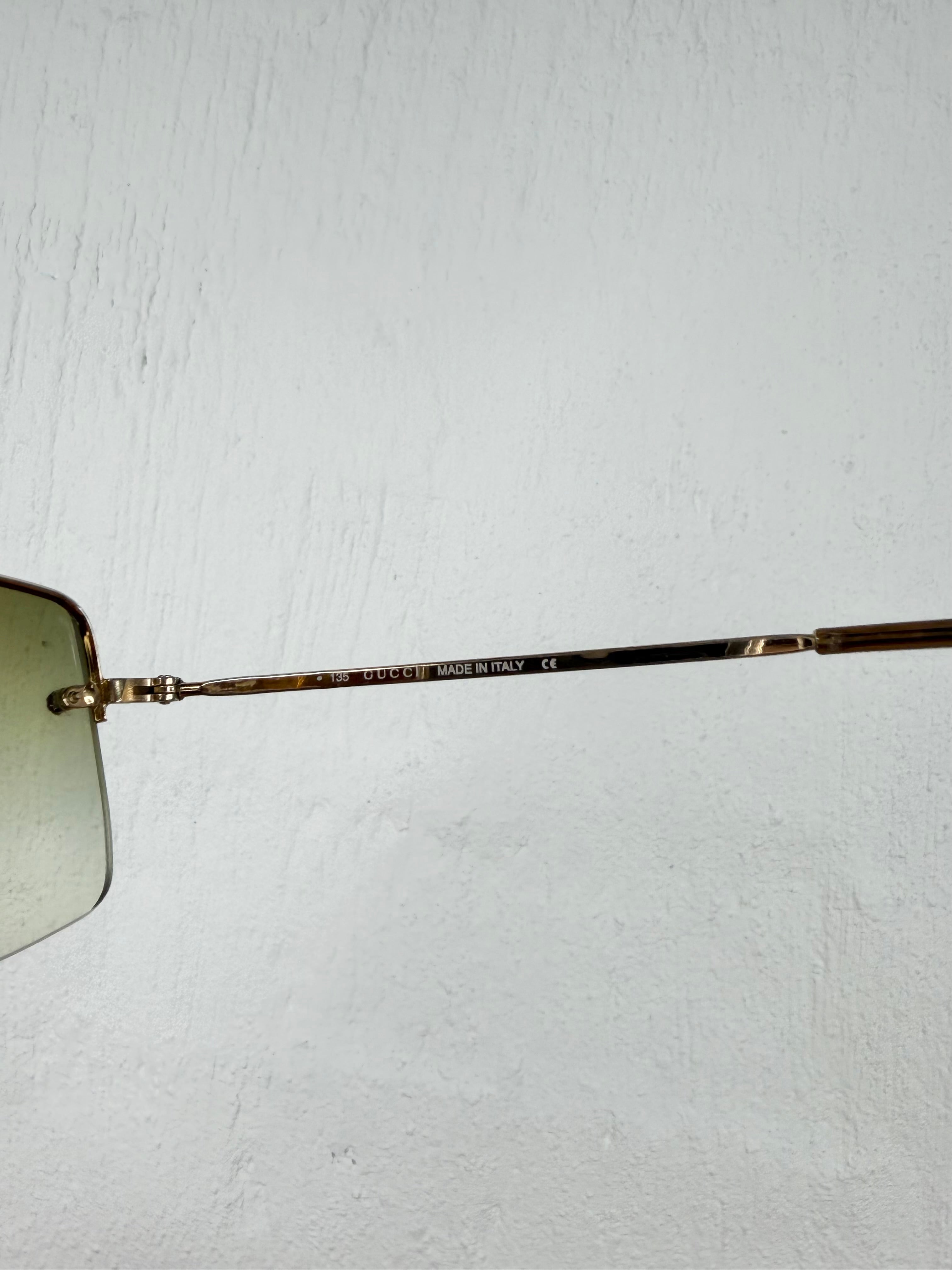 Gucci GG1653/S Gold Rimless Sunglasses