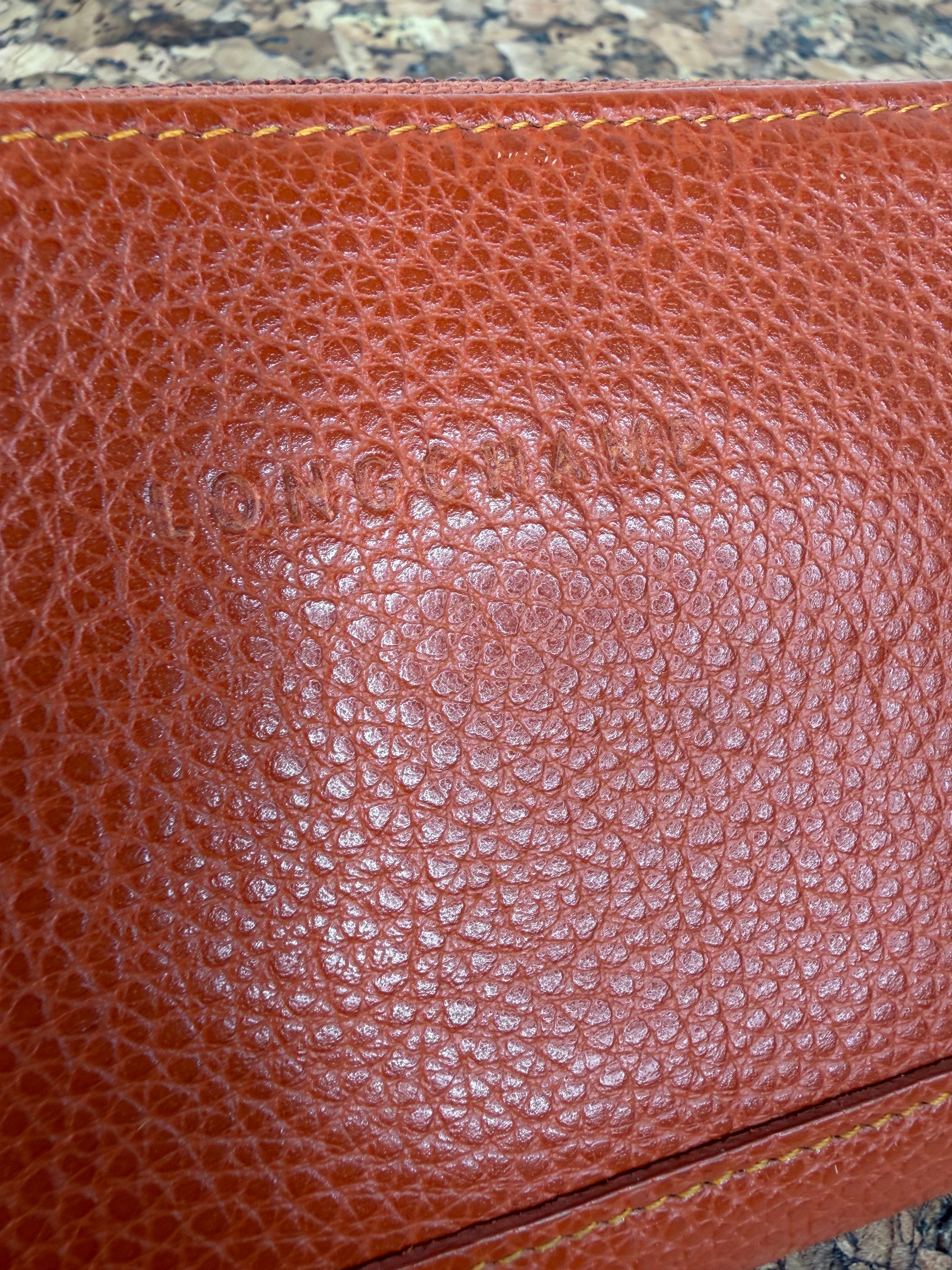 Longchamp Rust Pebbled Leather Wallet