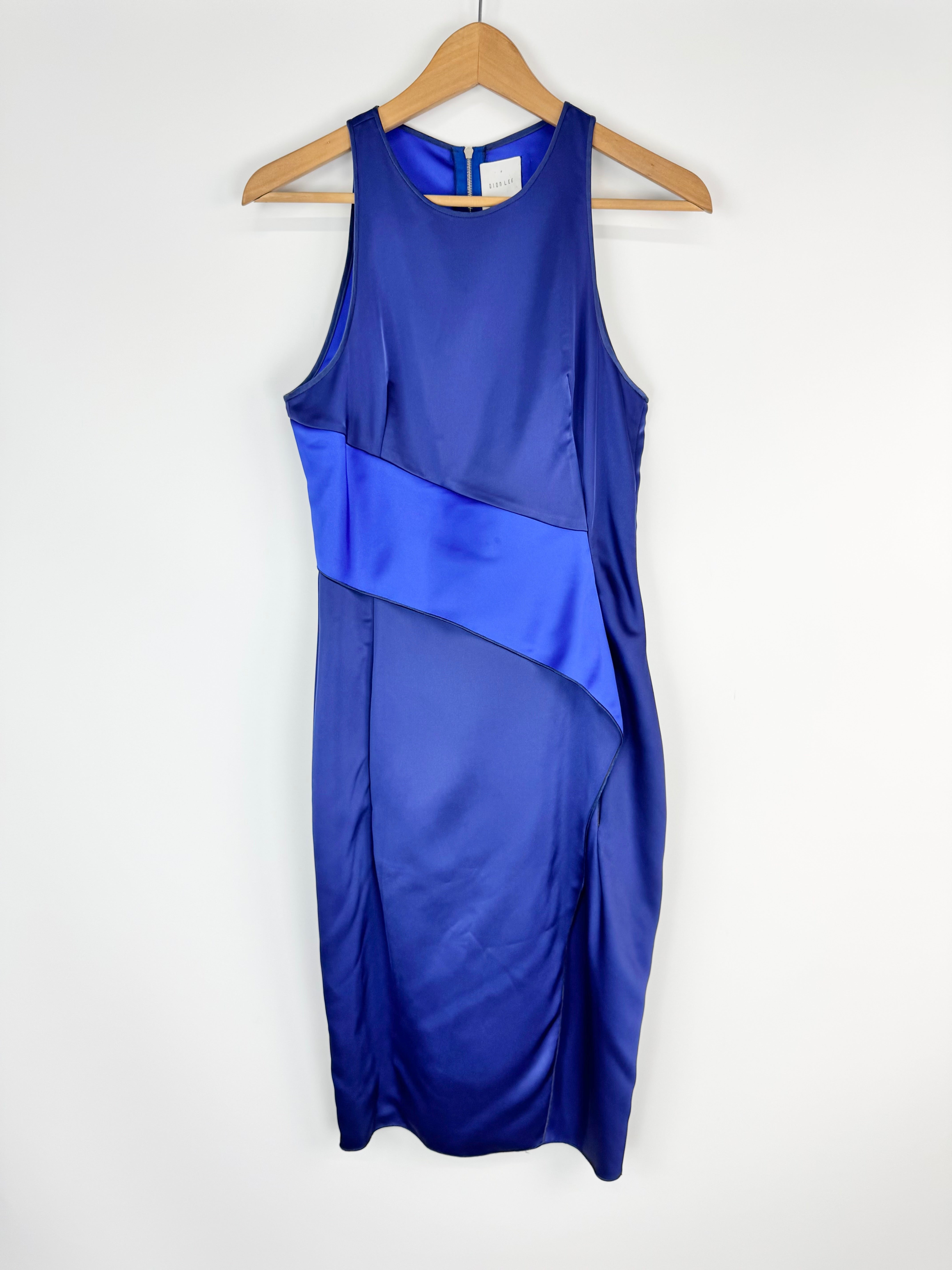 Blue dress on a hanger against a white background