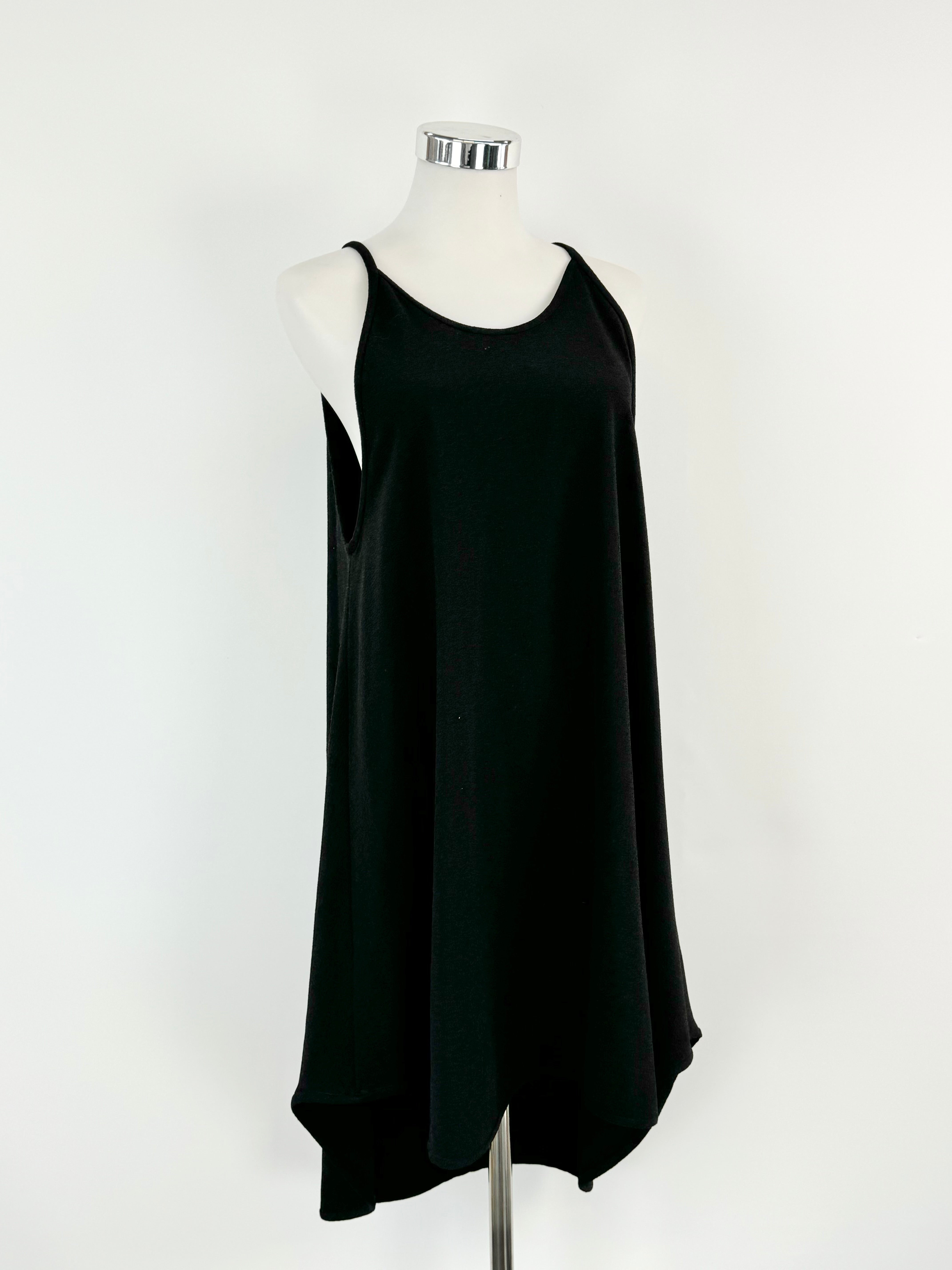 Black A-line swing dress displayed on a mannequin, with a halter neck and sleeveless design.