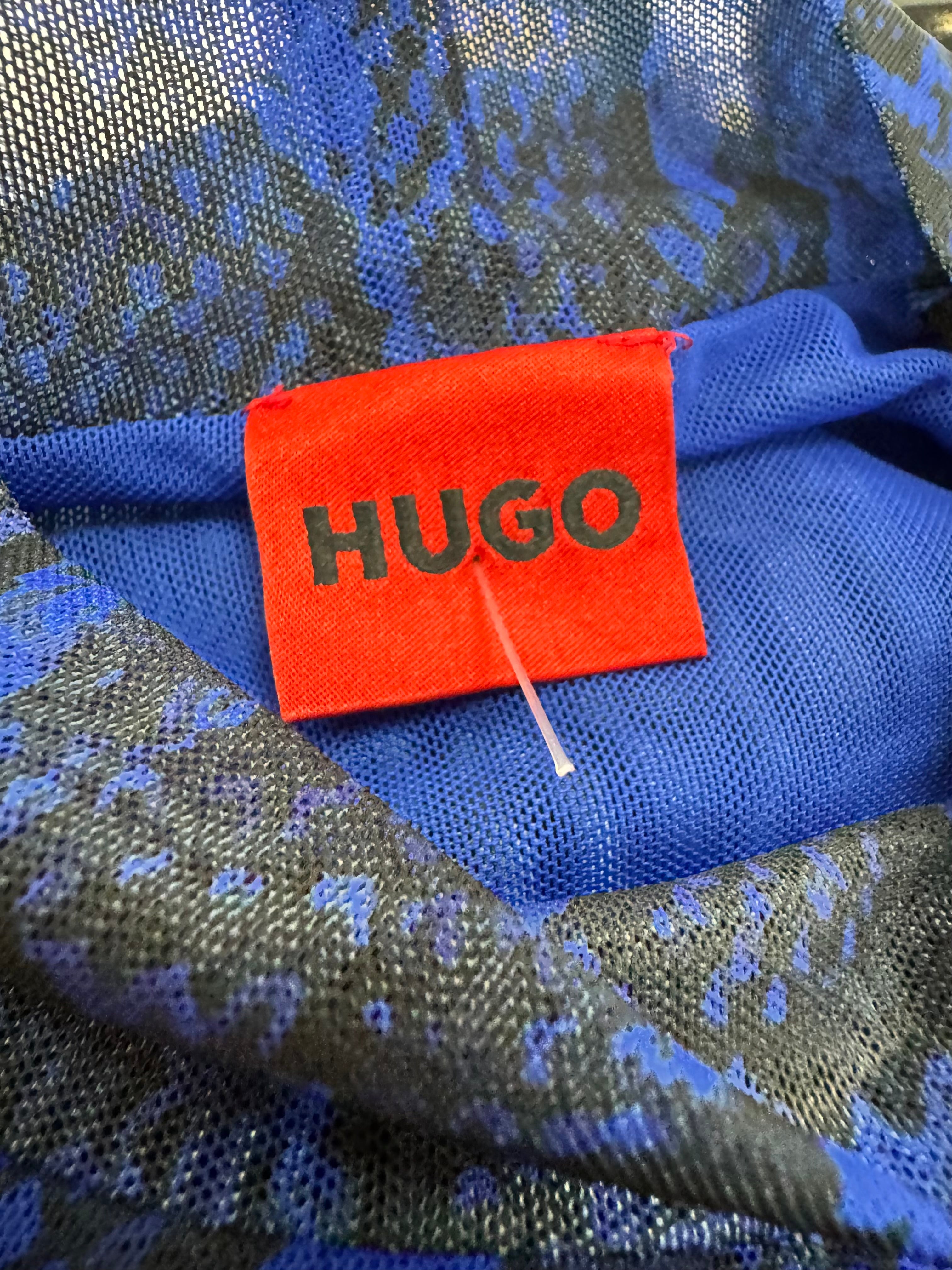 Hugo brand label on a blue and gray textured fabric