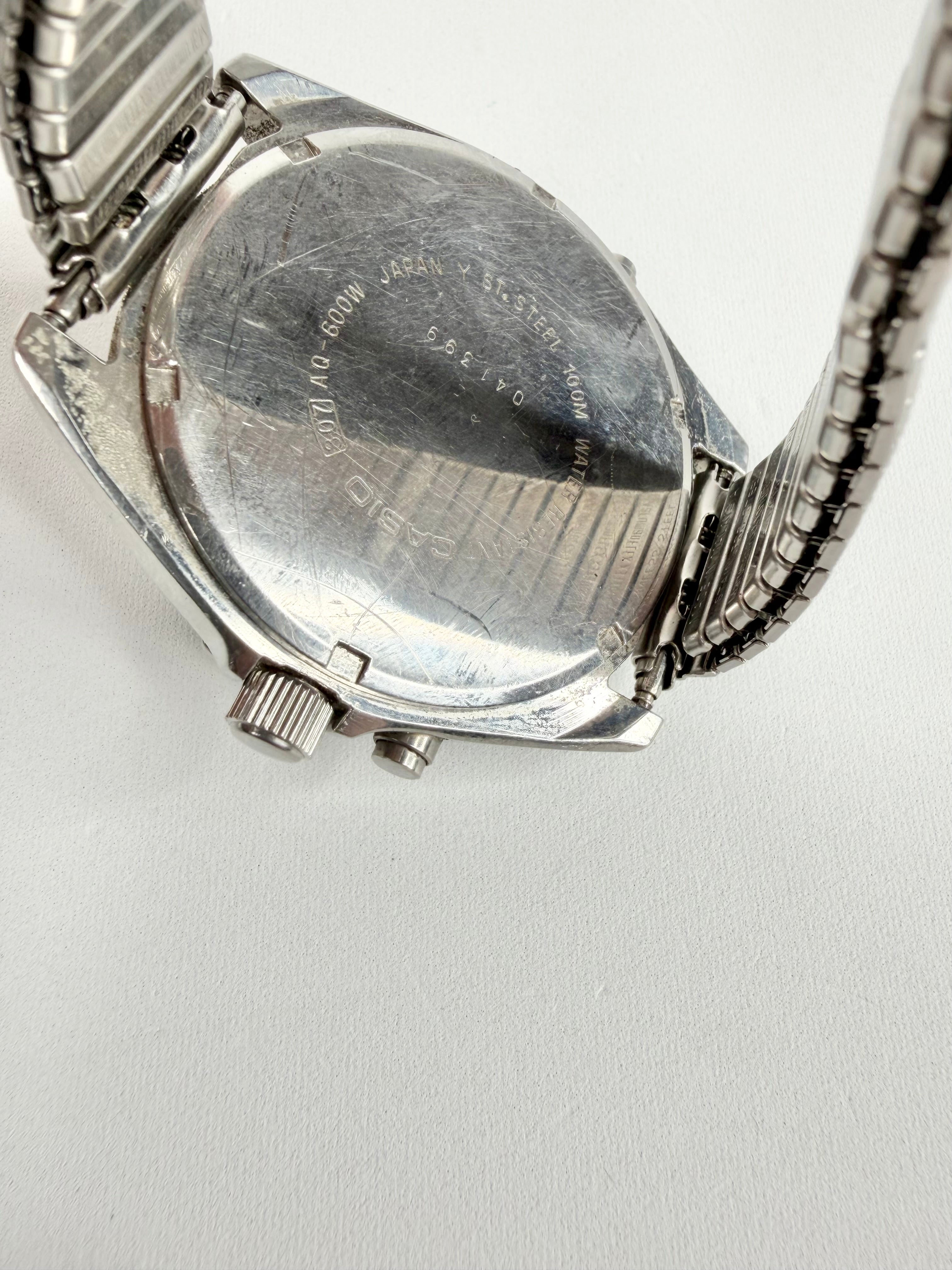 Vintage Casio Silver AQ-600W Ana-Digi Watch
