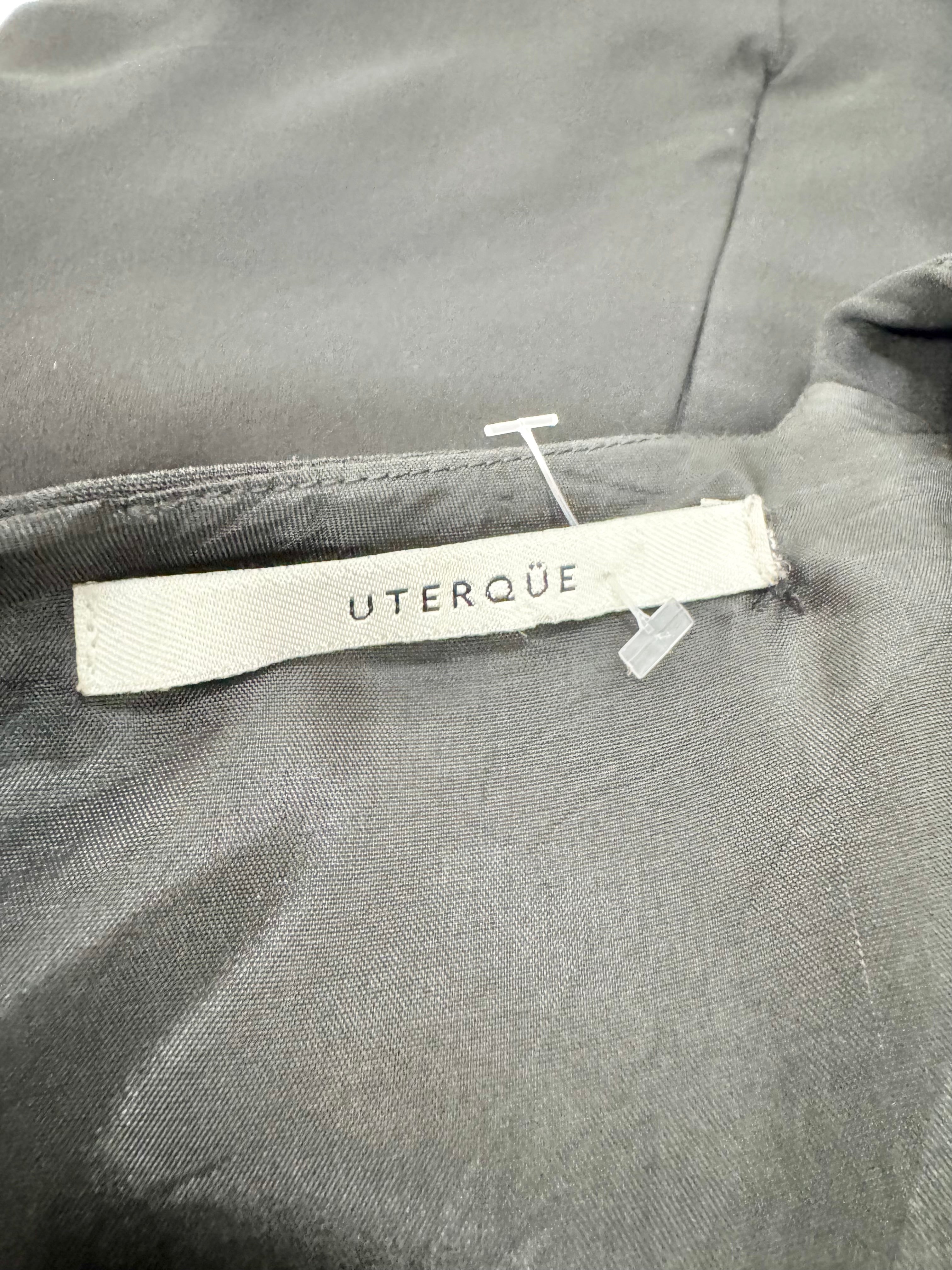Close-up of a Uterque label on a garment