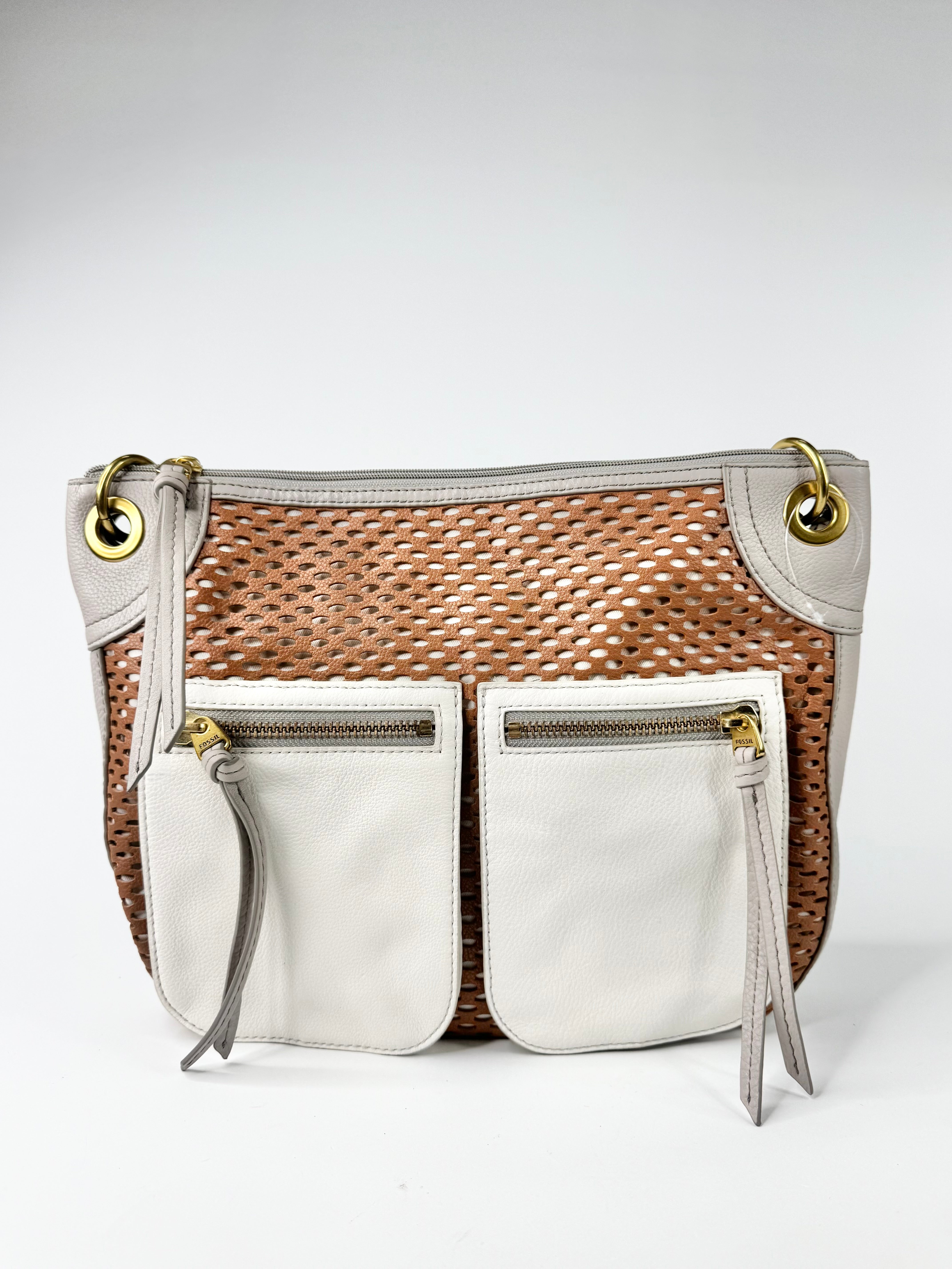 Grey & Tan leather handbag with white accents on a light gray background