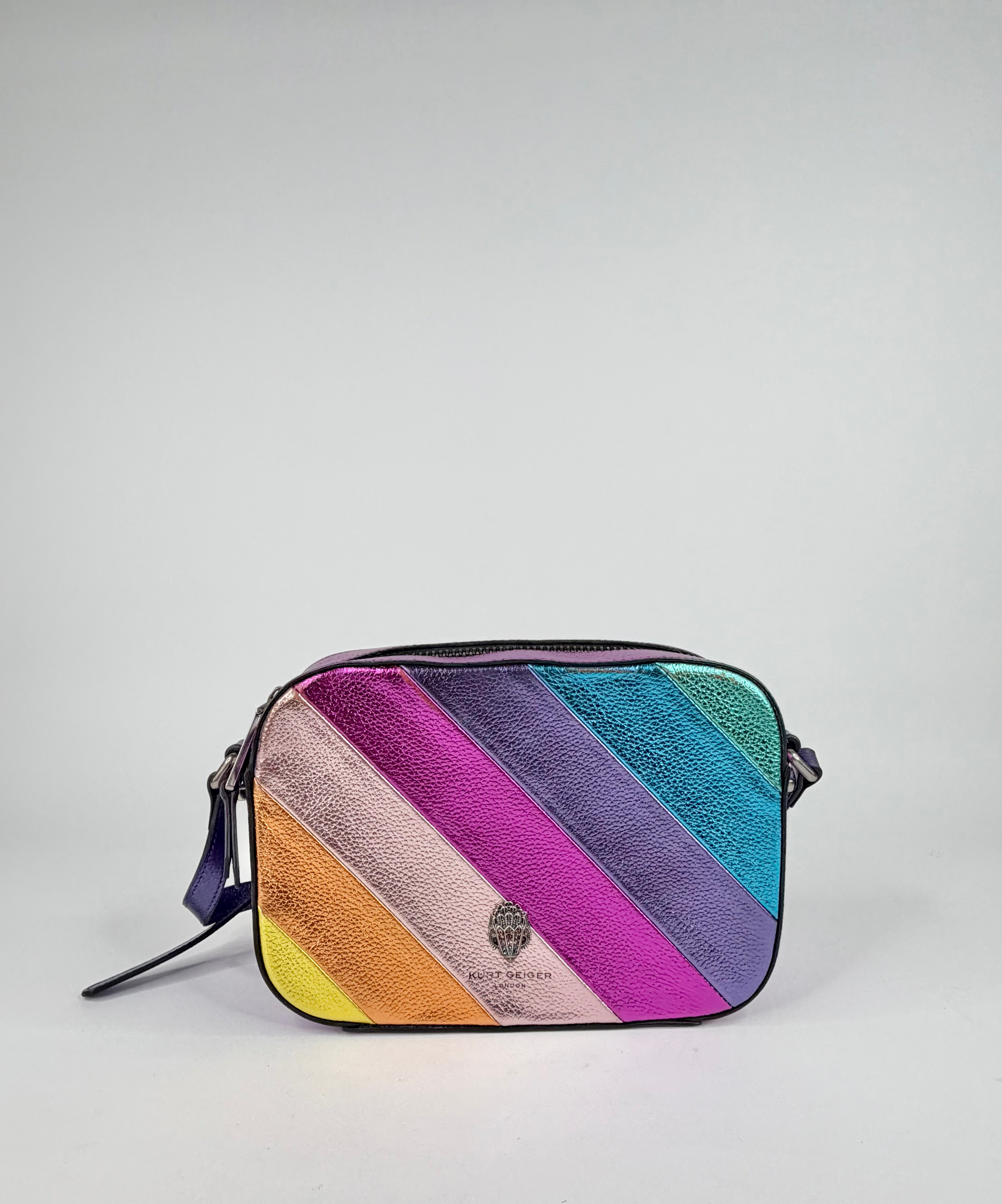 Multicolored striped bag on a light gray background