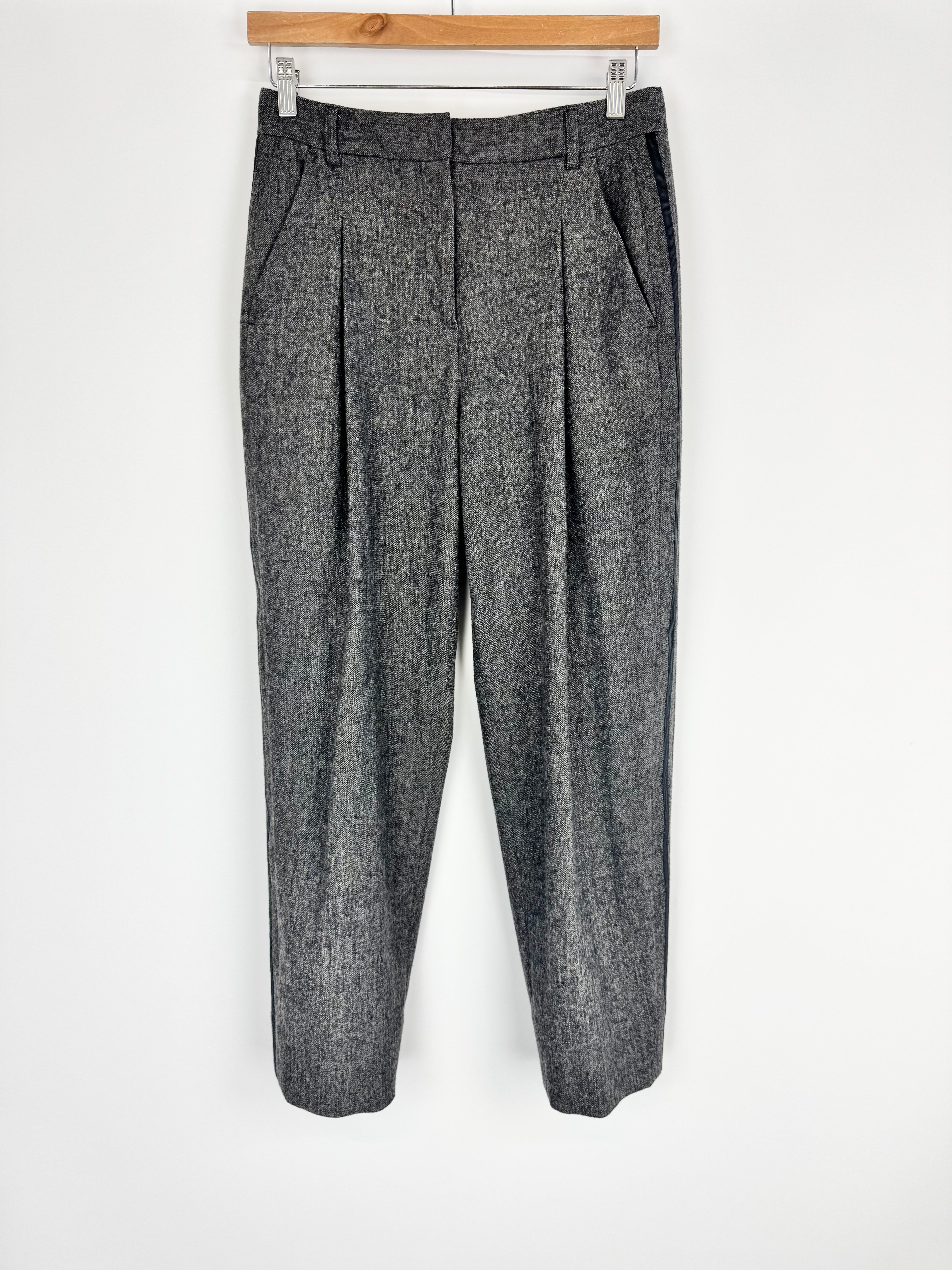 Gray pleated pants on a white background