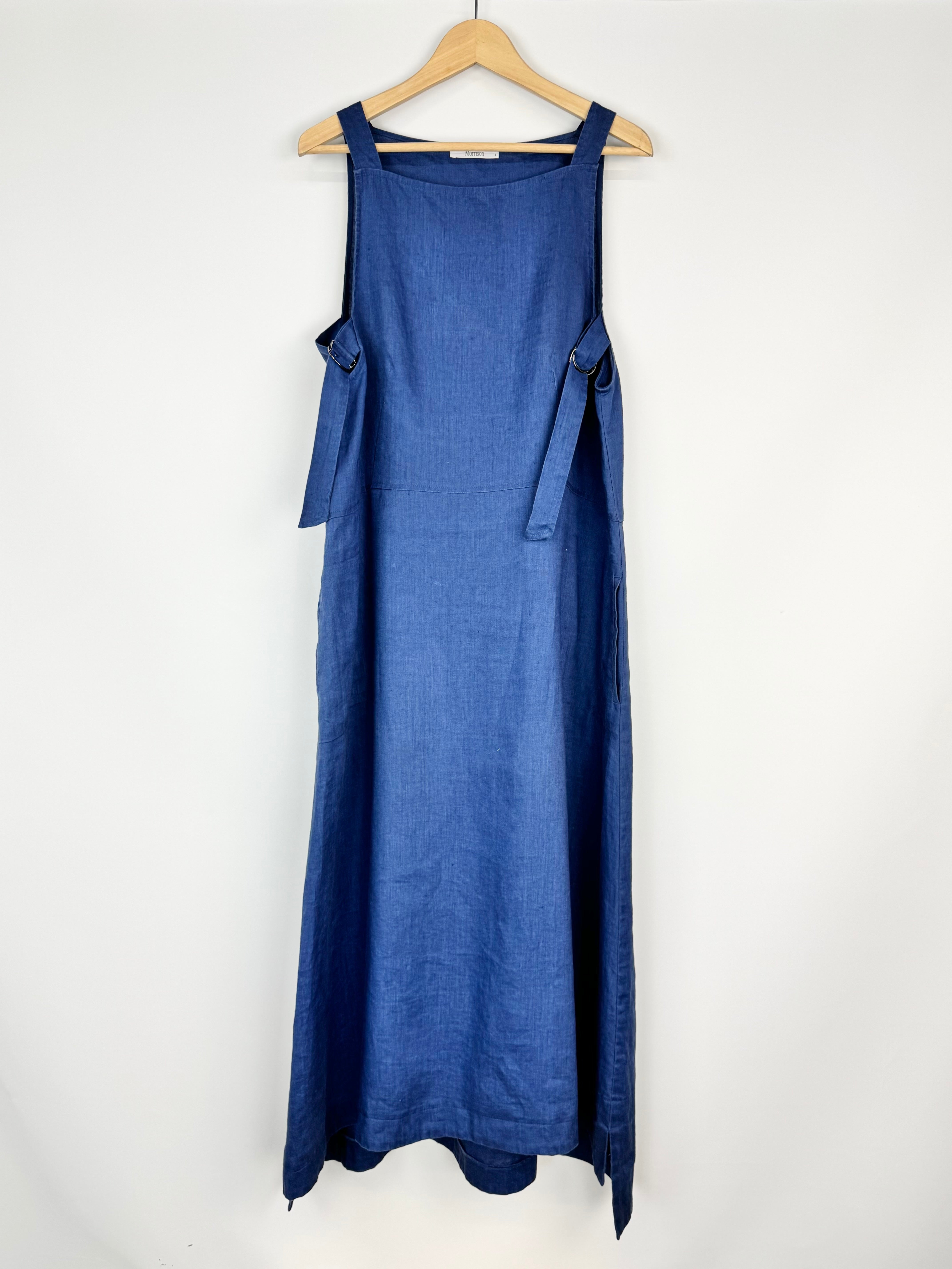 Blue dress on a hanger against a white background