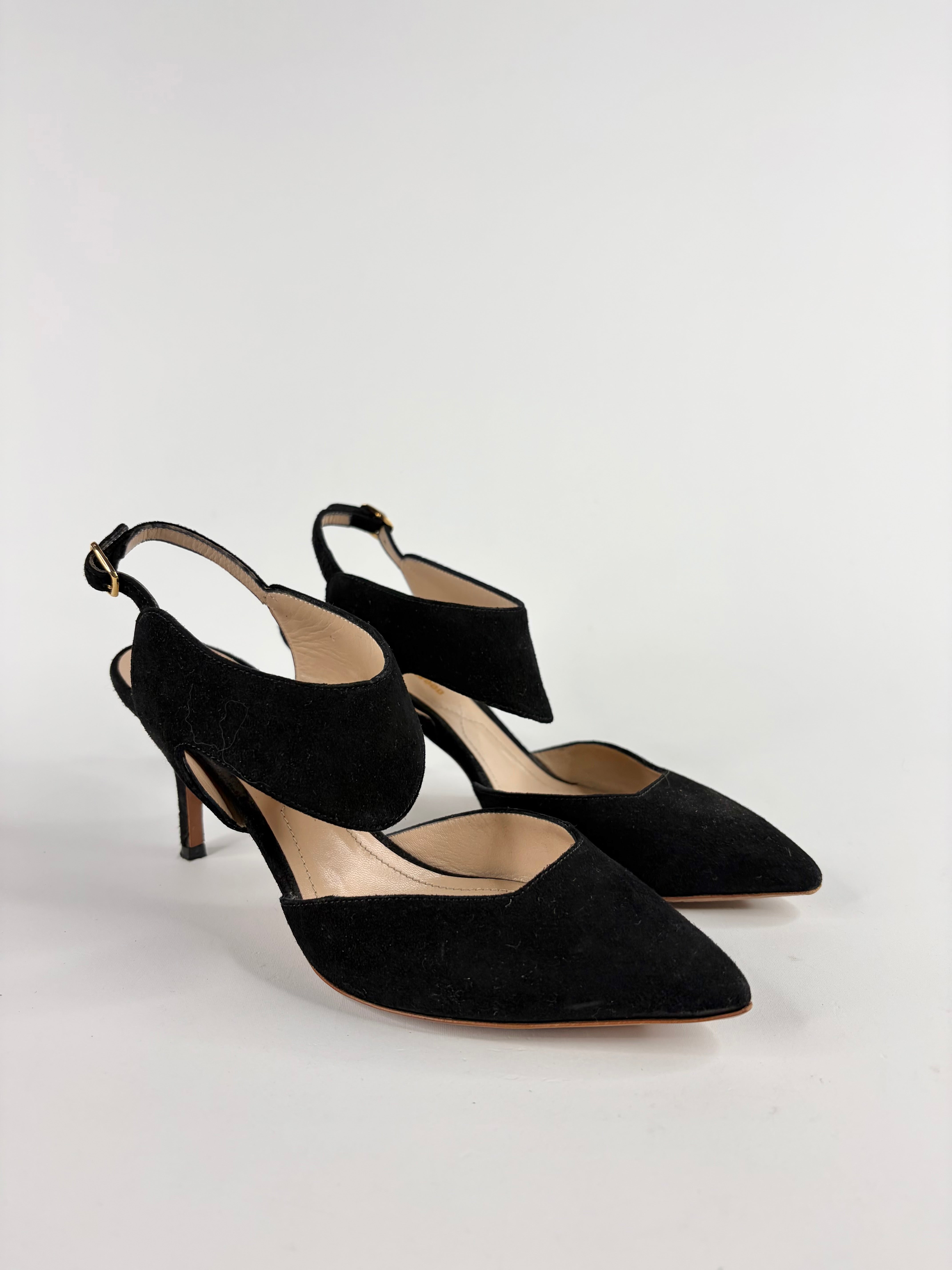 Black high-heeled shoes on a white background