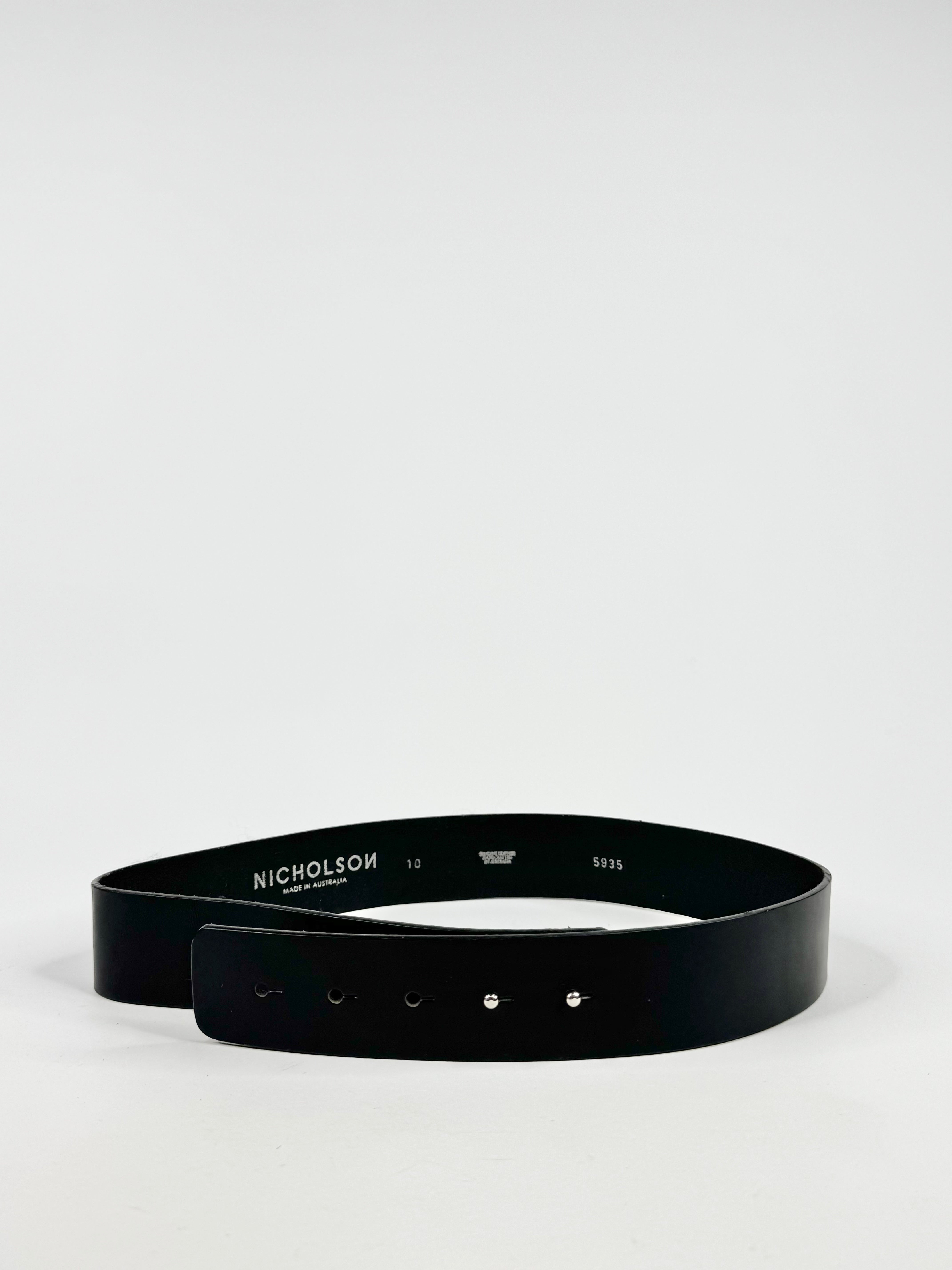 Black belt with visible brand name on a light gray background