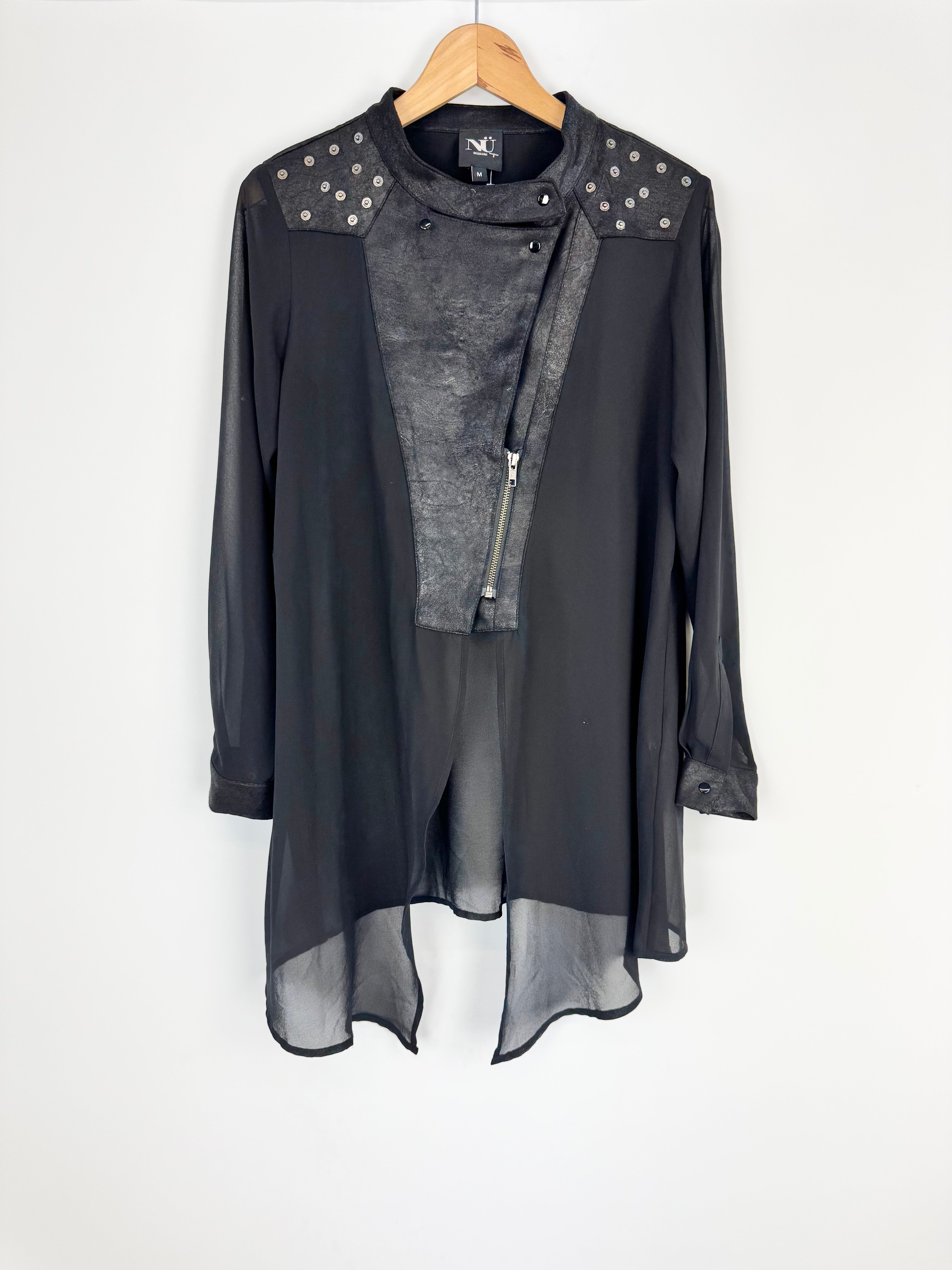 Black long-sleeve top with gray accents on a hanger against a white background
