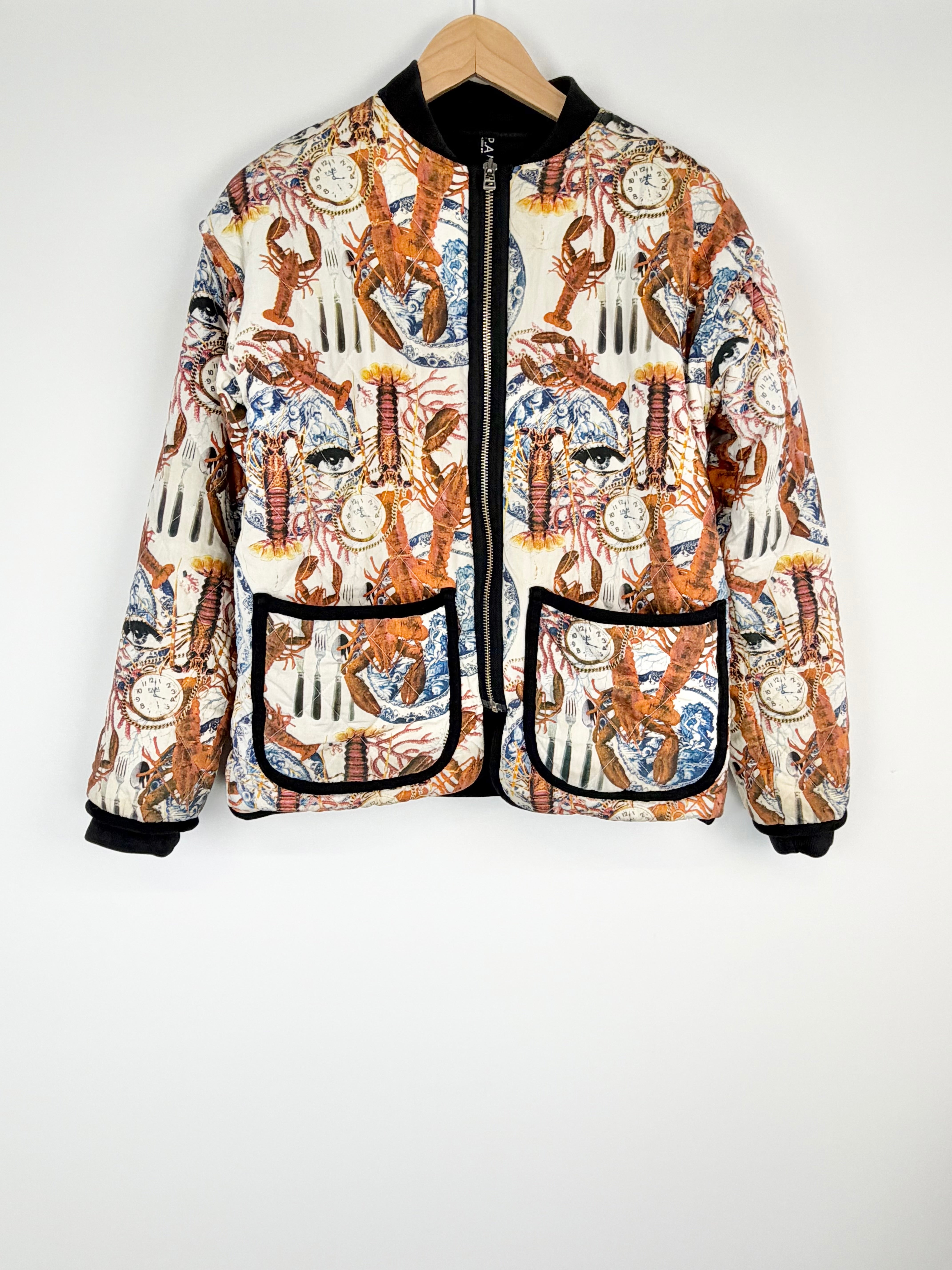 Colorful jacket with lobster pattern on a white background