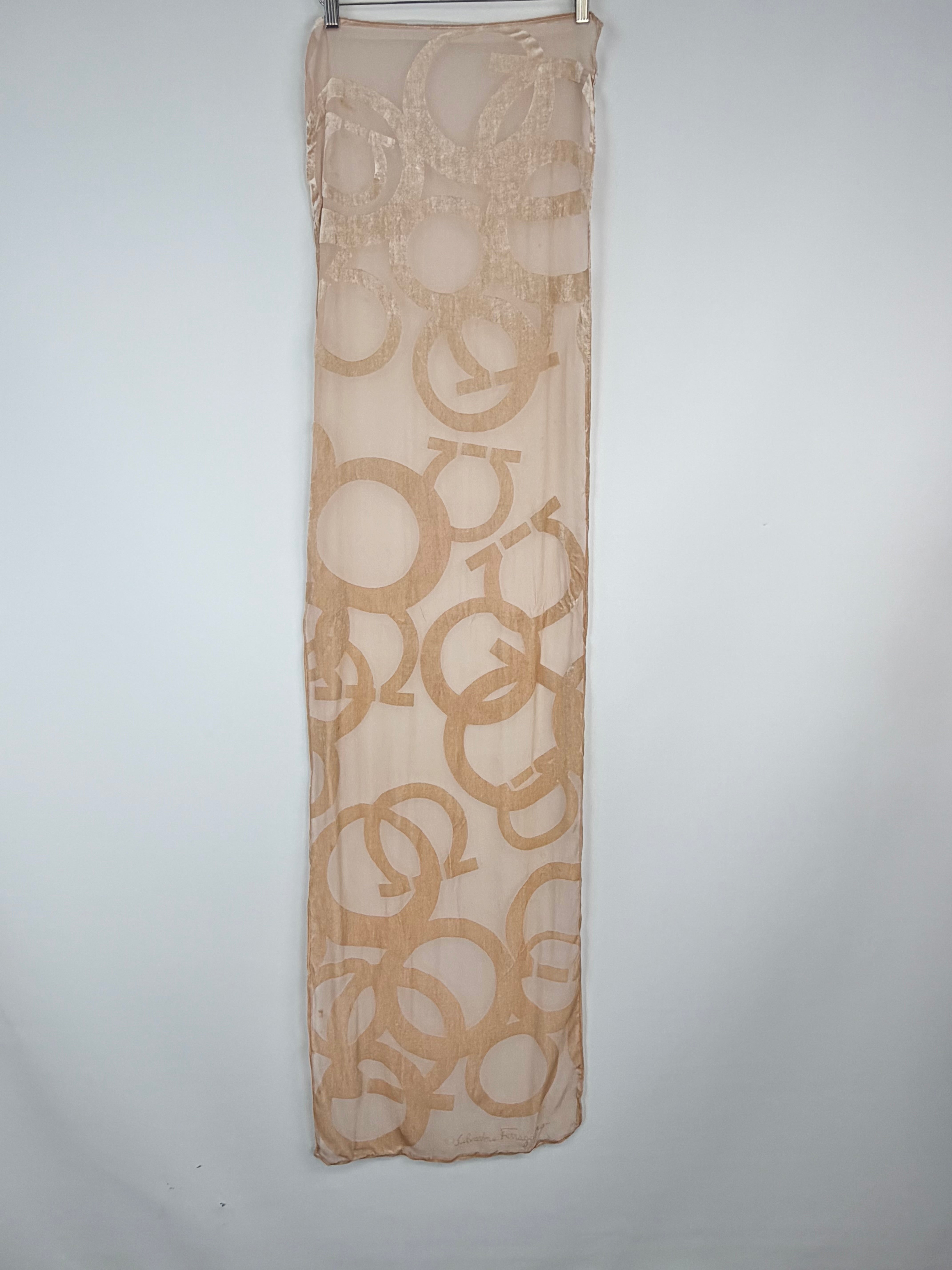 Beige patterned scarf on a white background