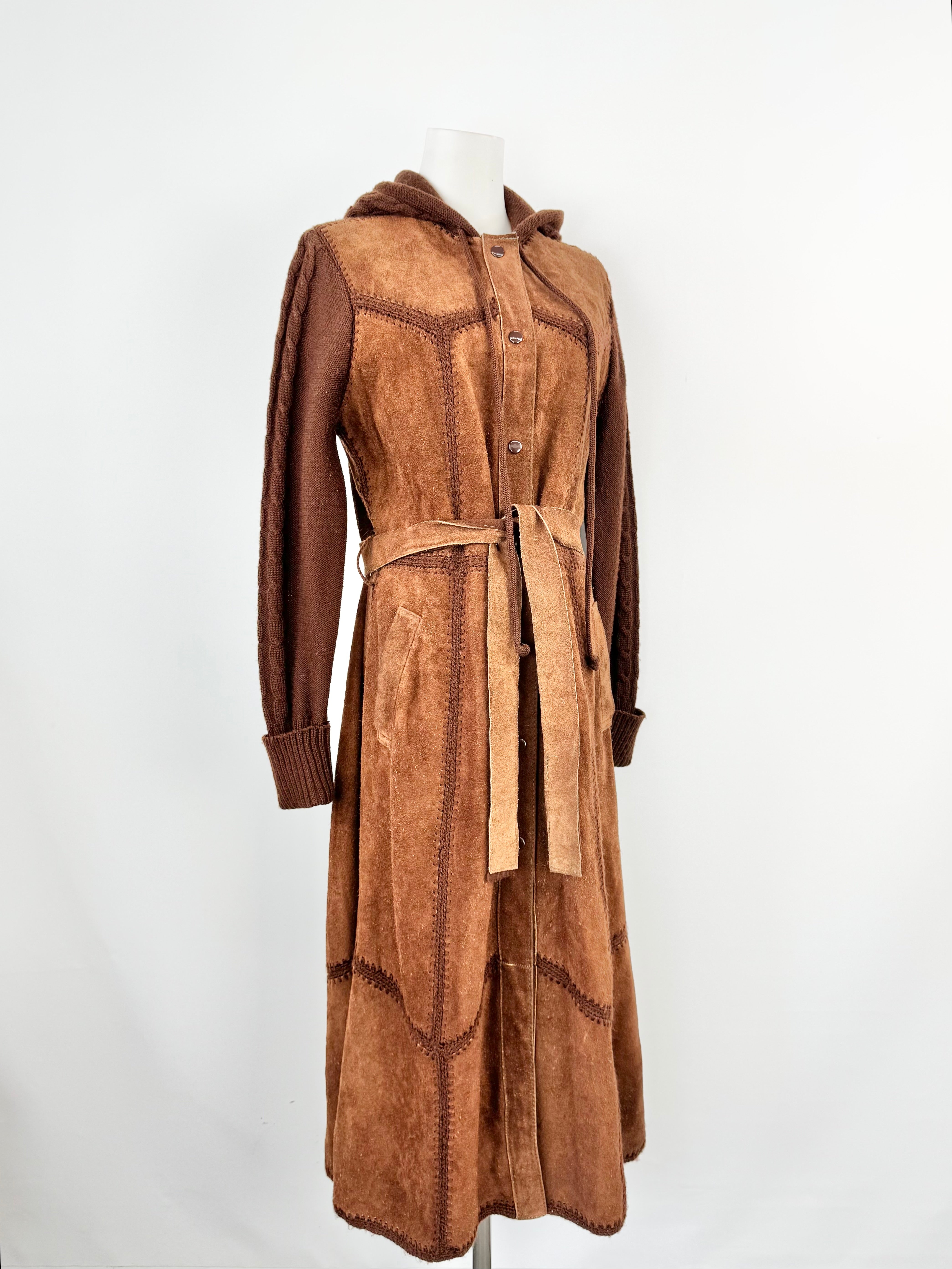 Brown suede coat on a mannequin against a white background