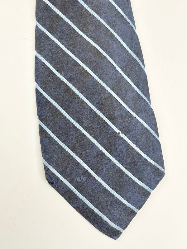 Blue striped tie on a white background