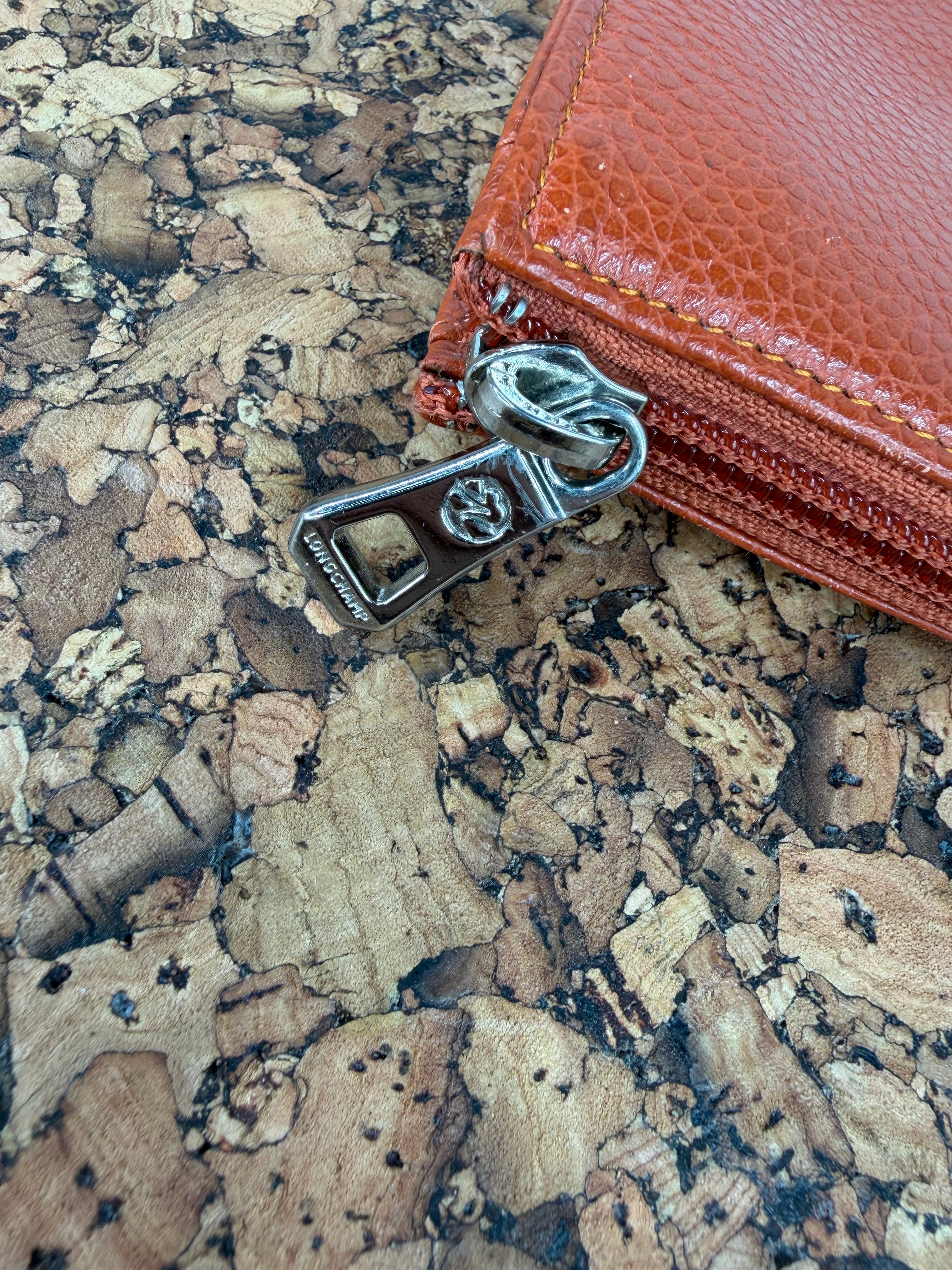 Longchamp Rust Pebbled Leather Wallet