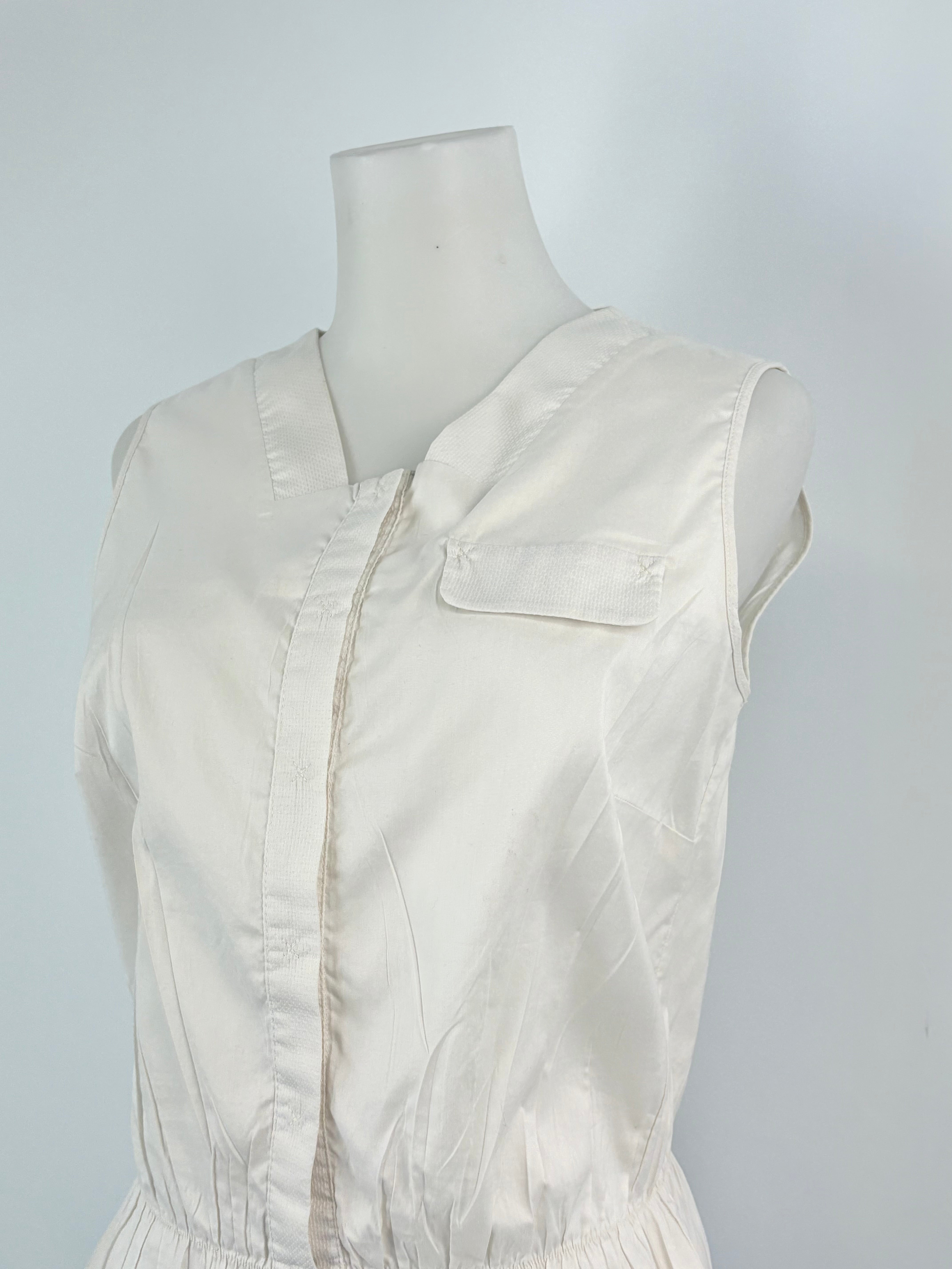 Cotélac Ivory Sleeveless Button-Up Peplum Top - AU8