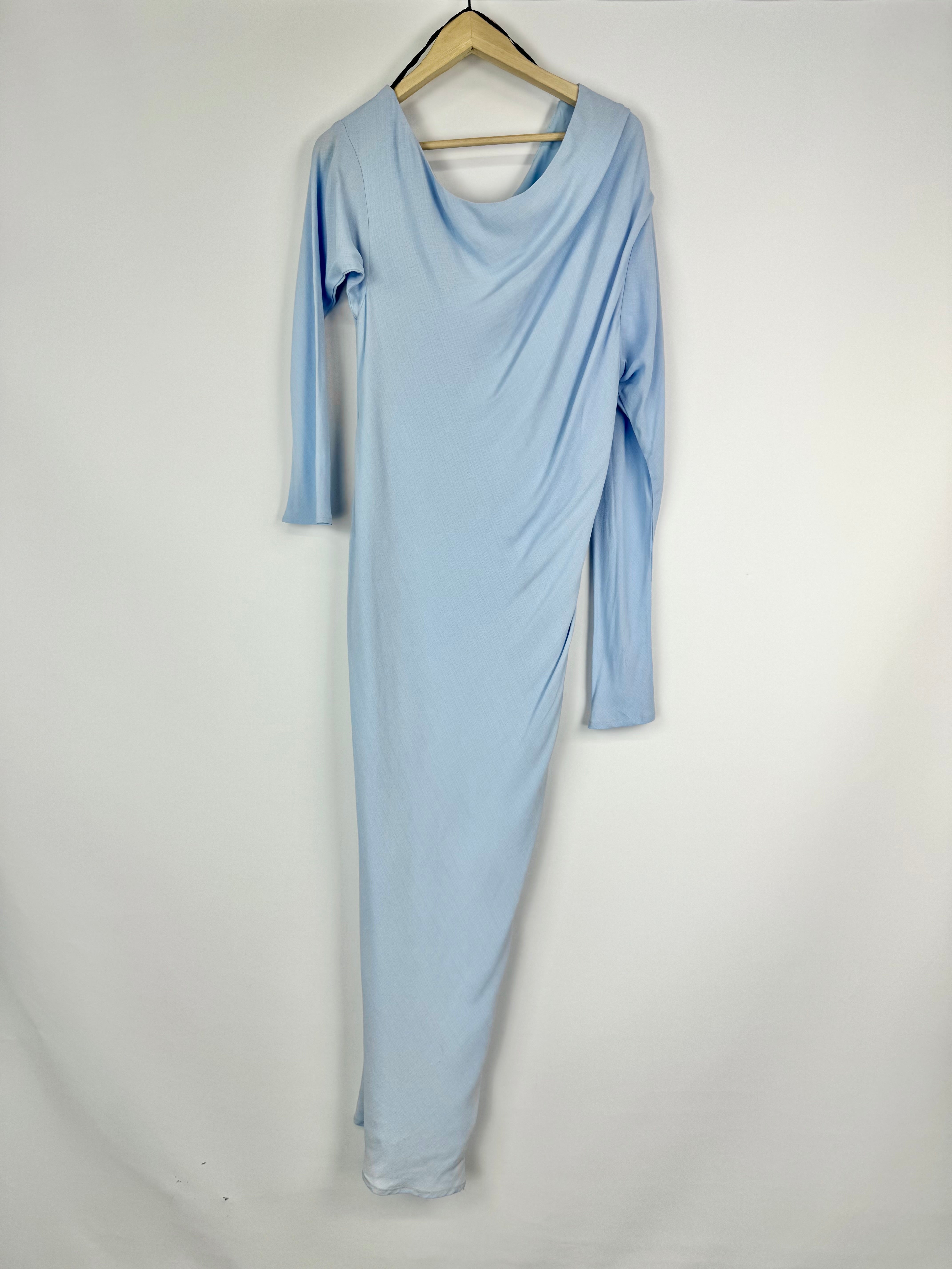 Light blue long-sleeve dress on a hanger against a white background