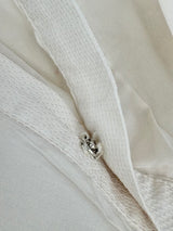 Cotélac Ivory Sleeveless Button-Up Peplum Top - AU8