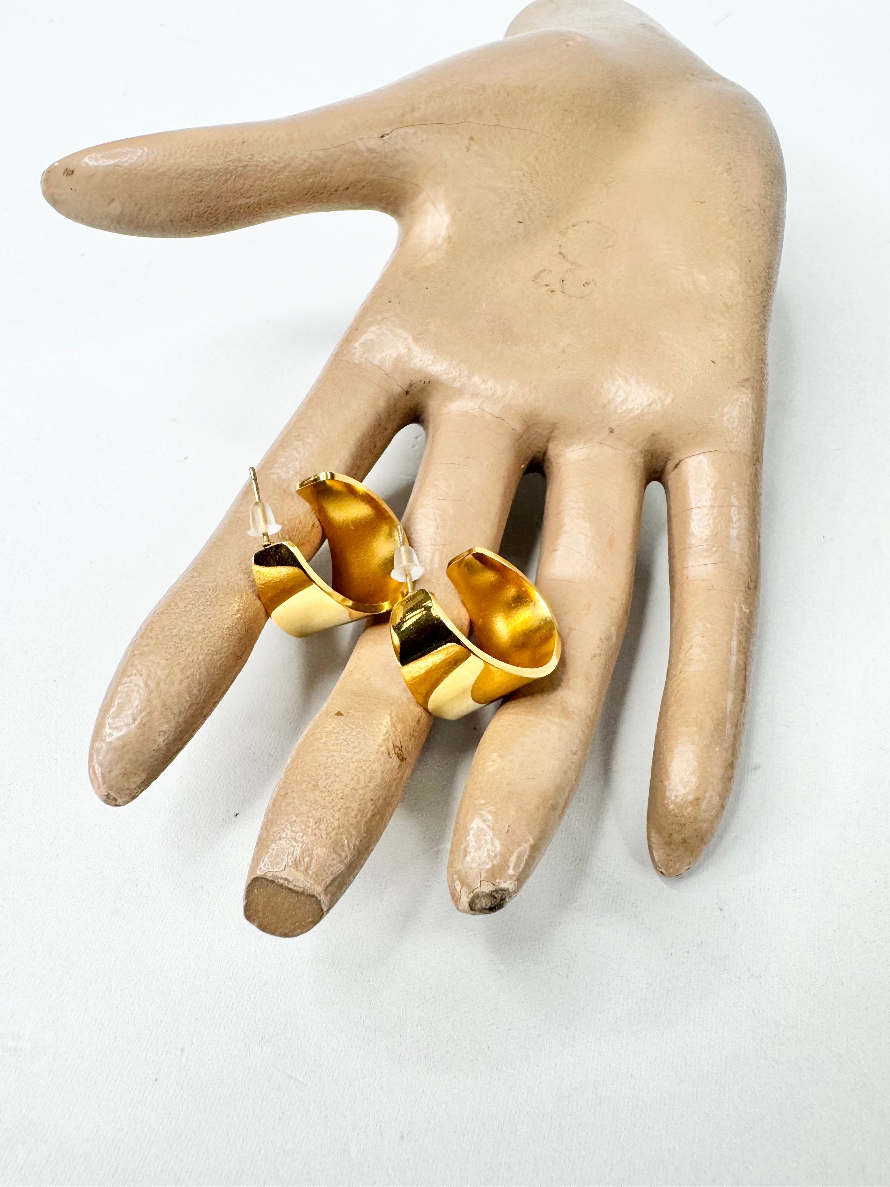 MFW Broad Gold Tone Hoop Earrings