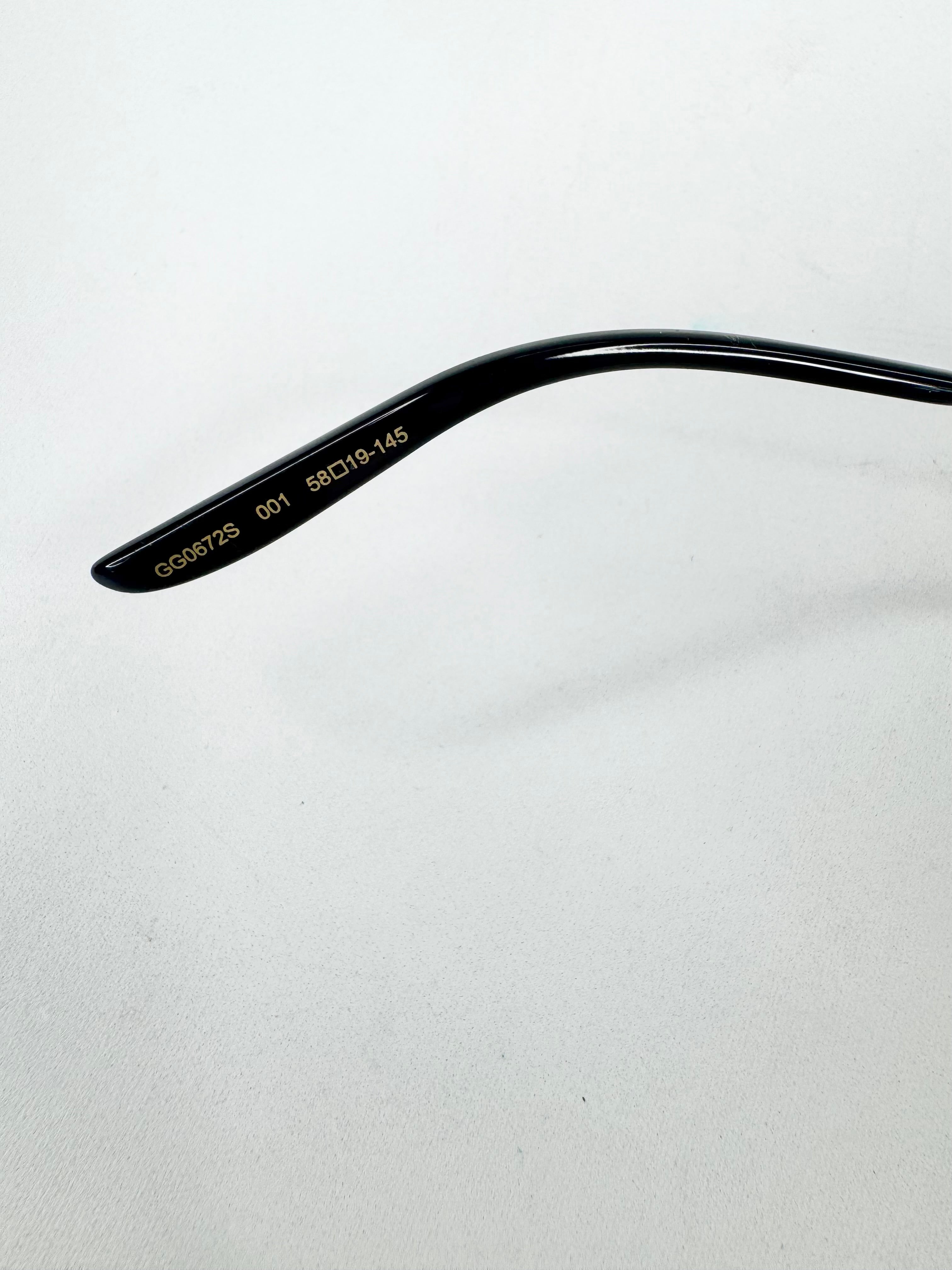 Gucci GG0672S Black & Gold Aviator Sunglasses