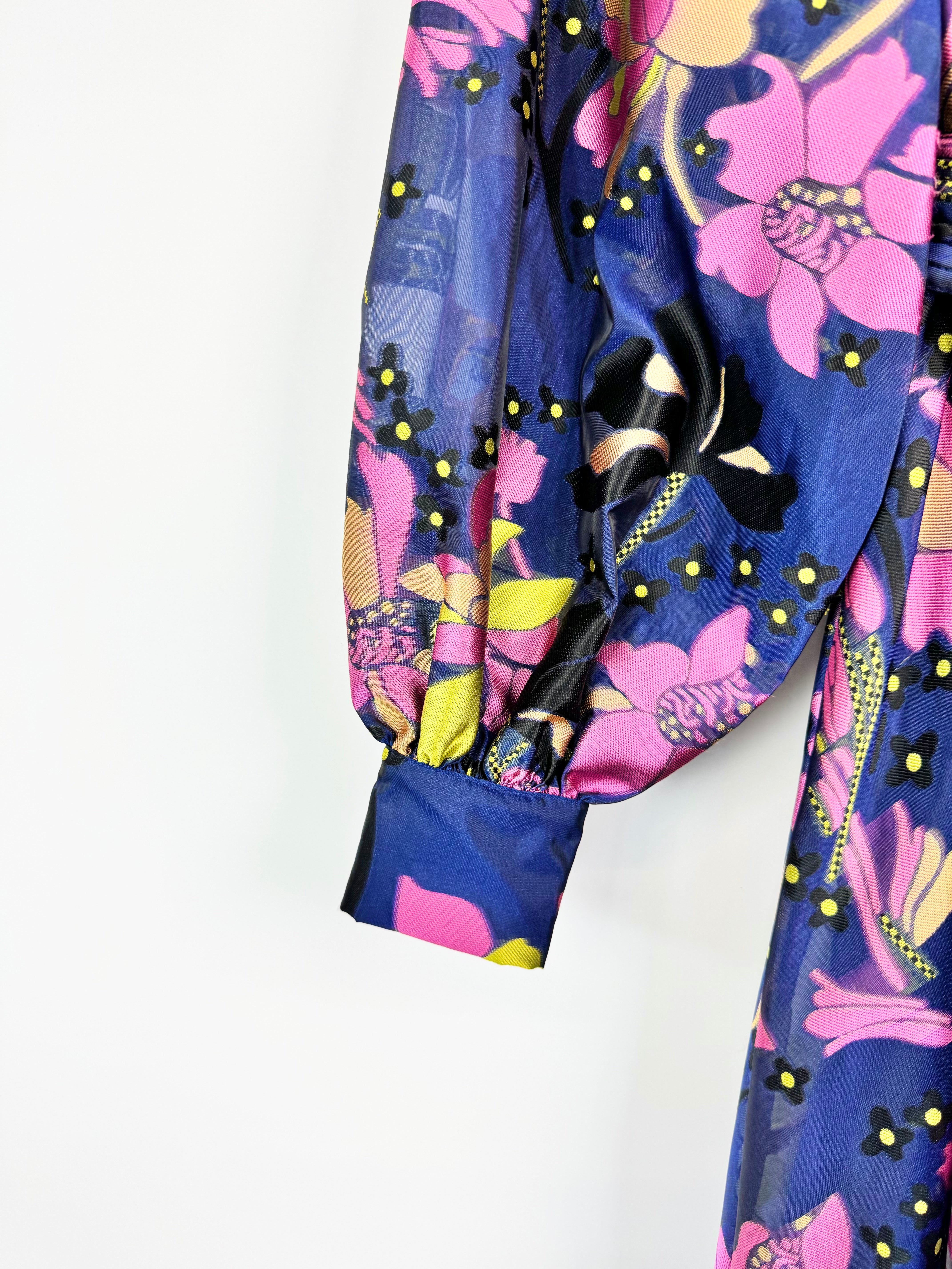 Colorful floral-patterned fabric with a white background
