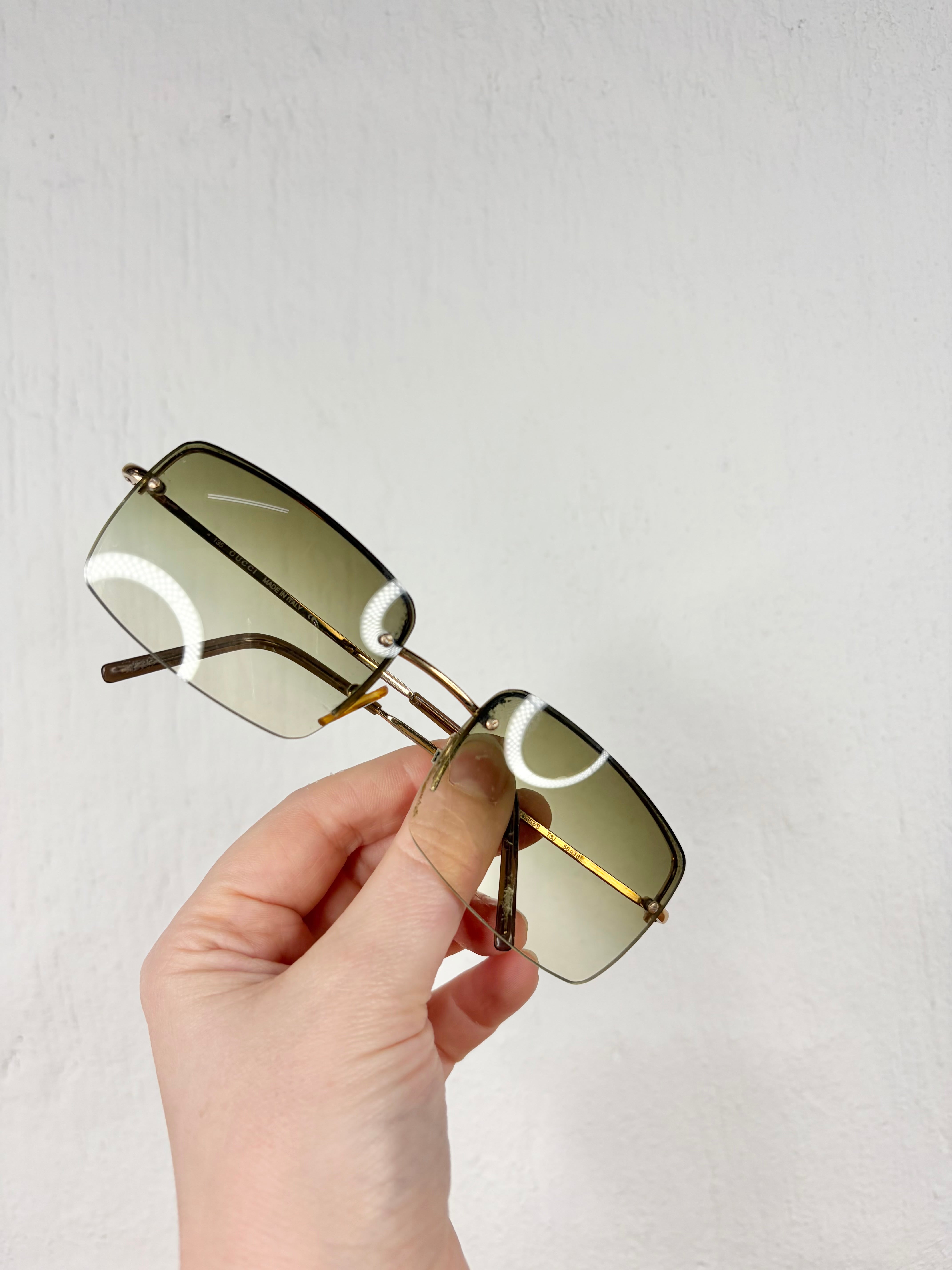 Gucci GG1653/S Gold Rimless Sunglasses