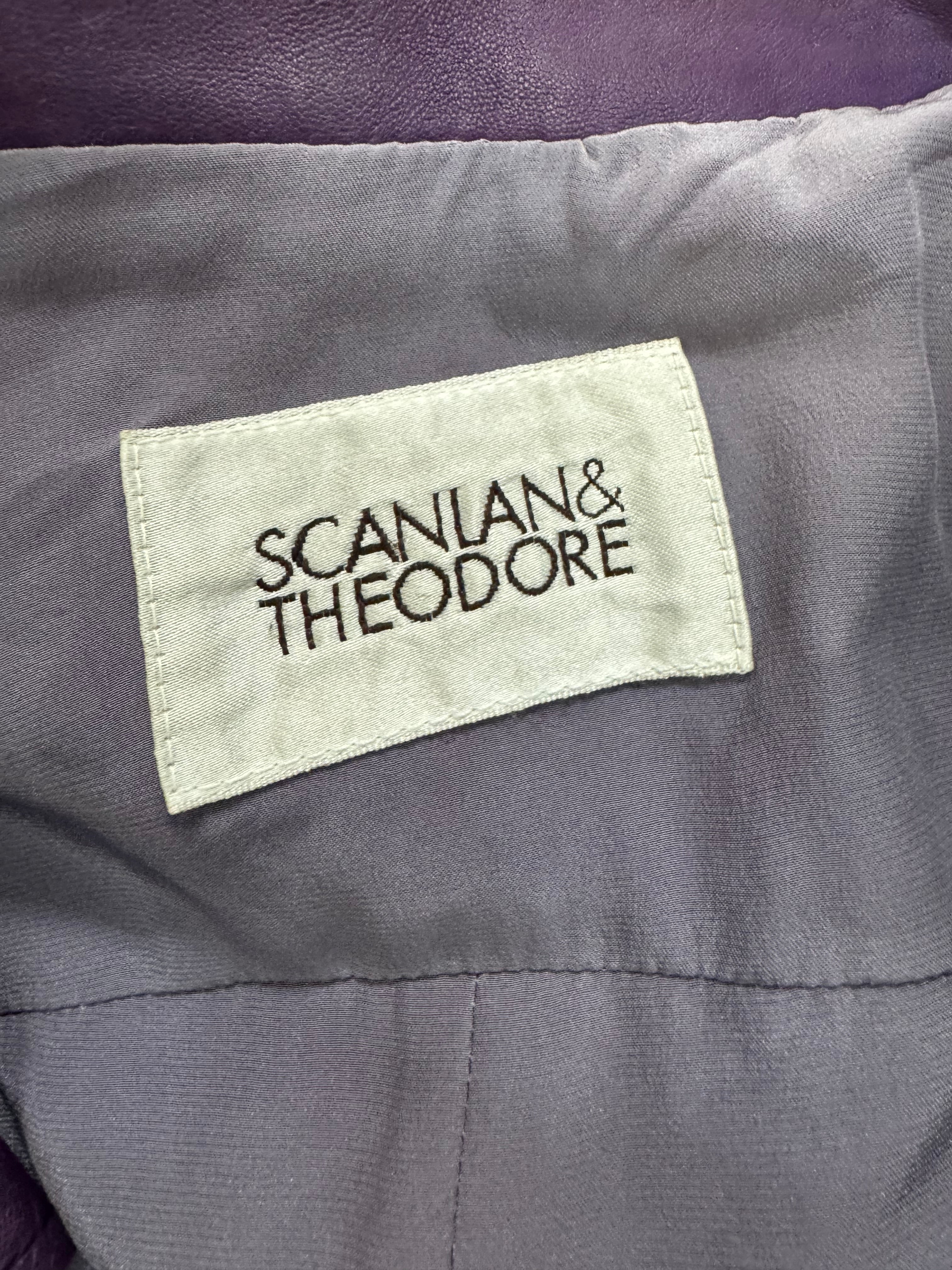 Label with 'Scalpian & Theodore' text on a gray fabric background