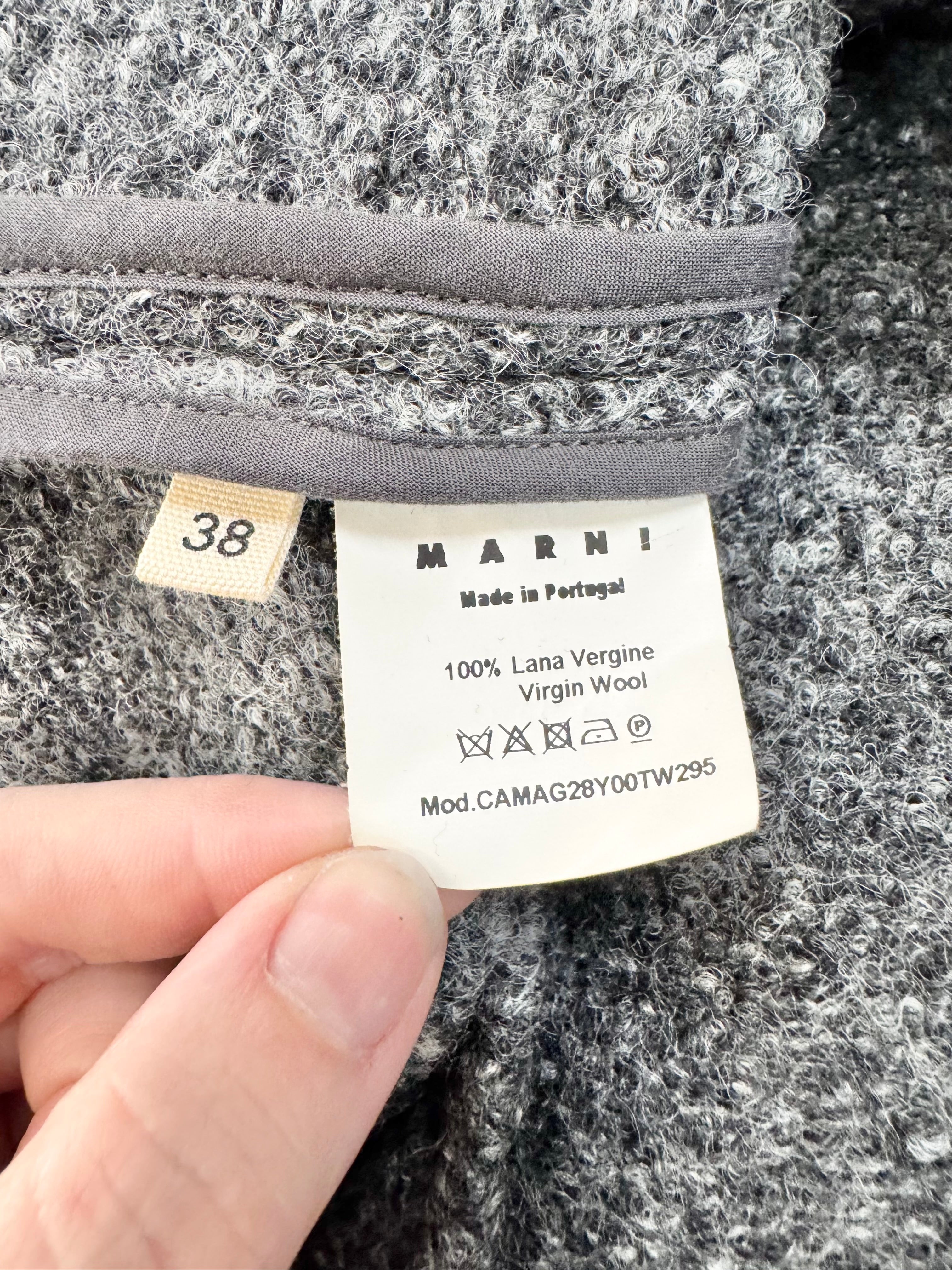 Marni label on a textured fabric background