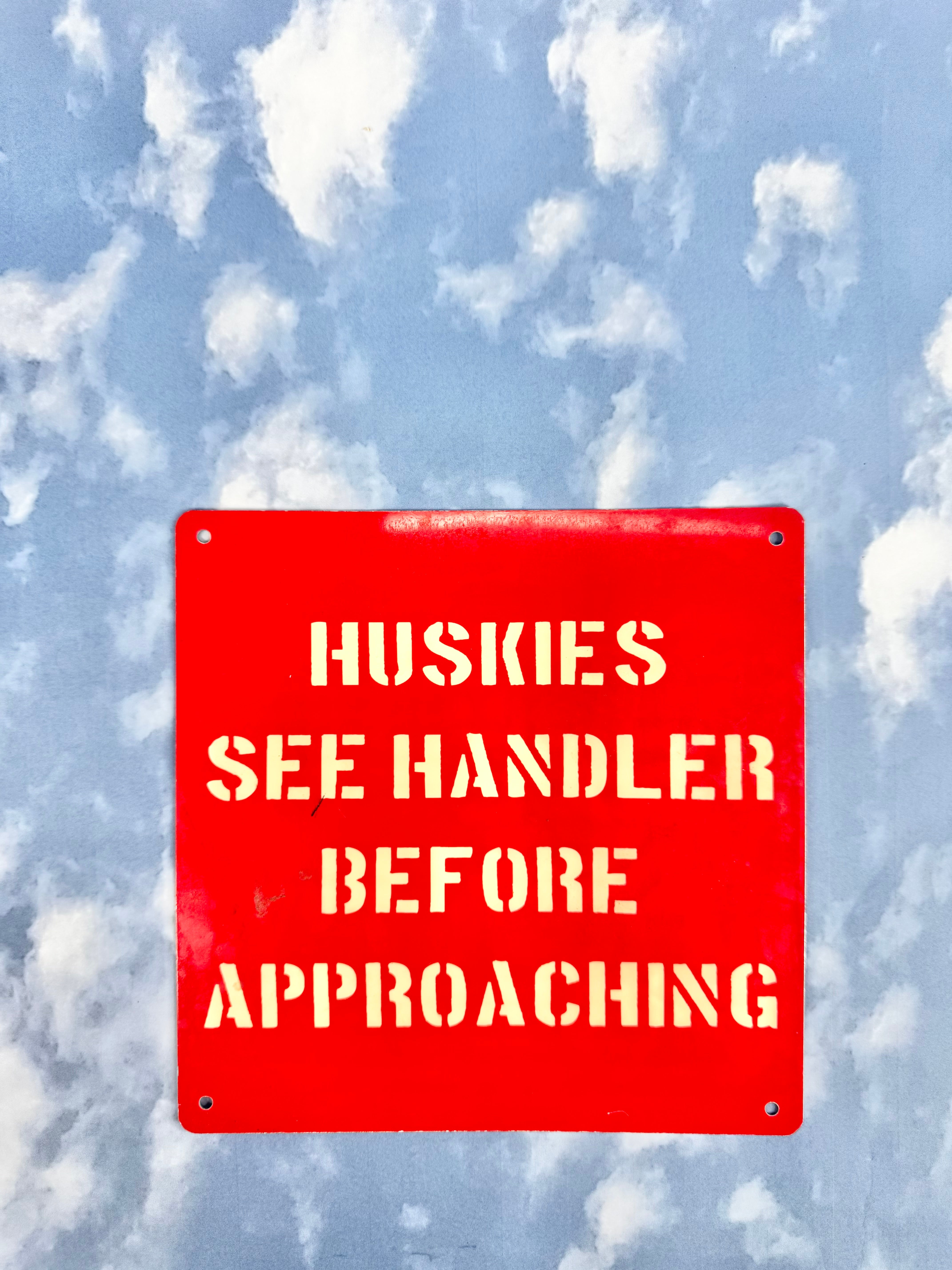 Huskies See Handler Before Approaching Red Sign