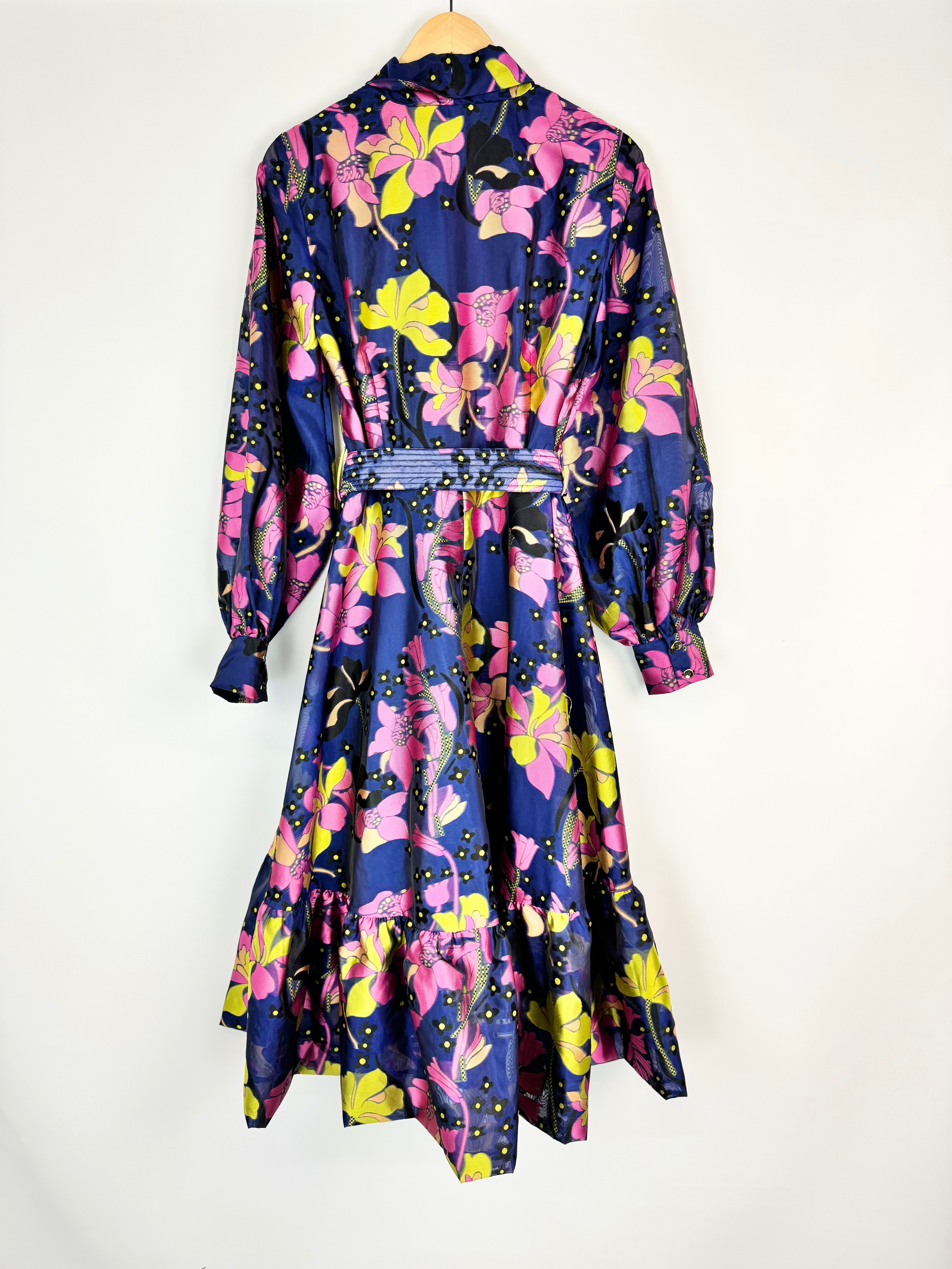 Floral patterned dress on a white background