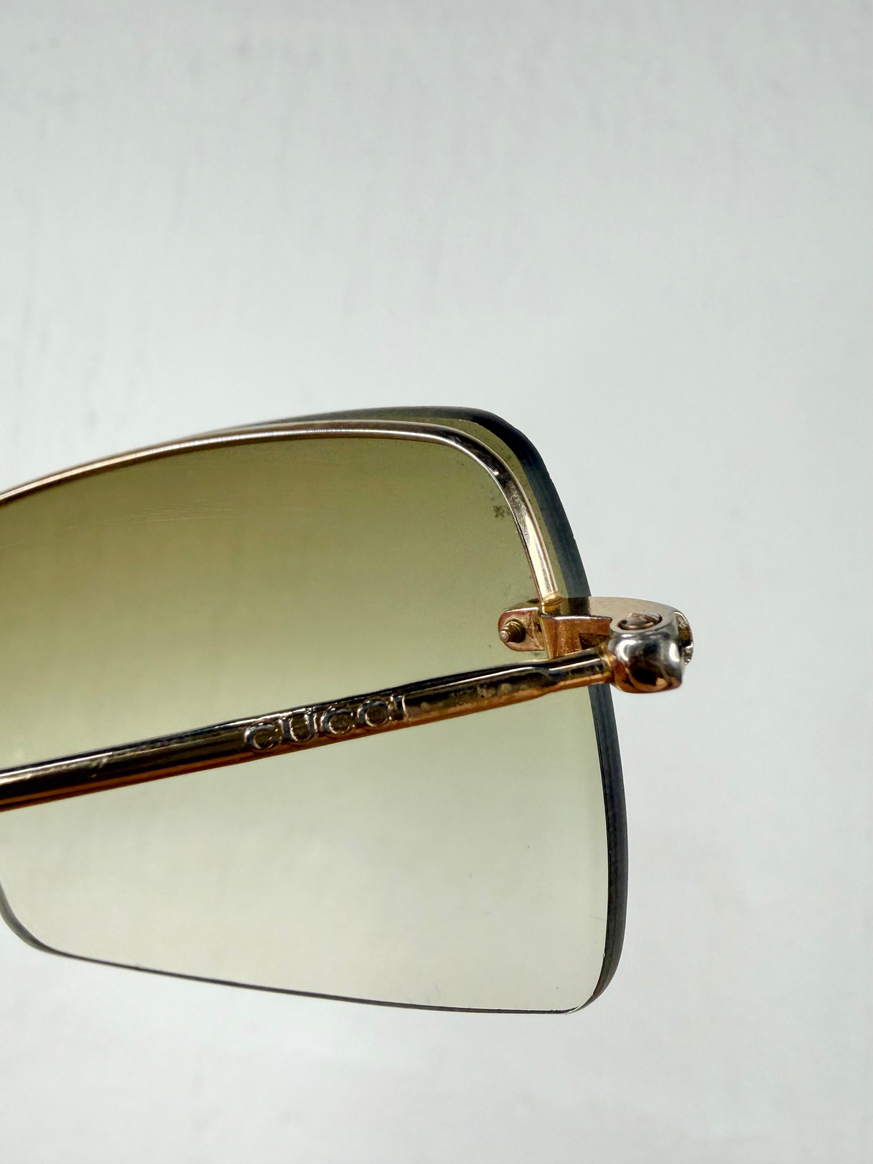 Gucci GG1653/S Gold Rimless Sunglasses