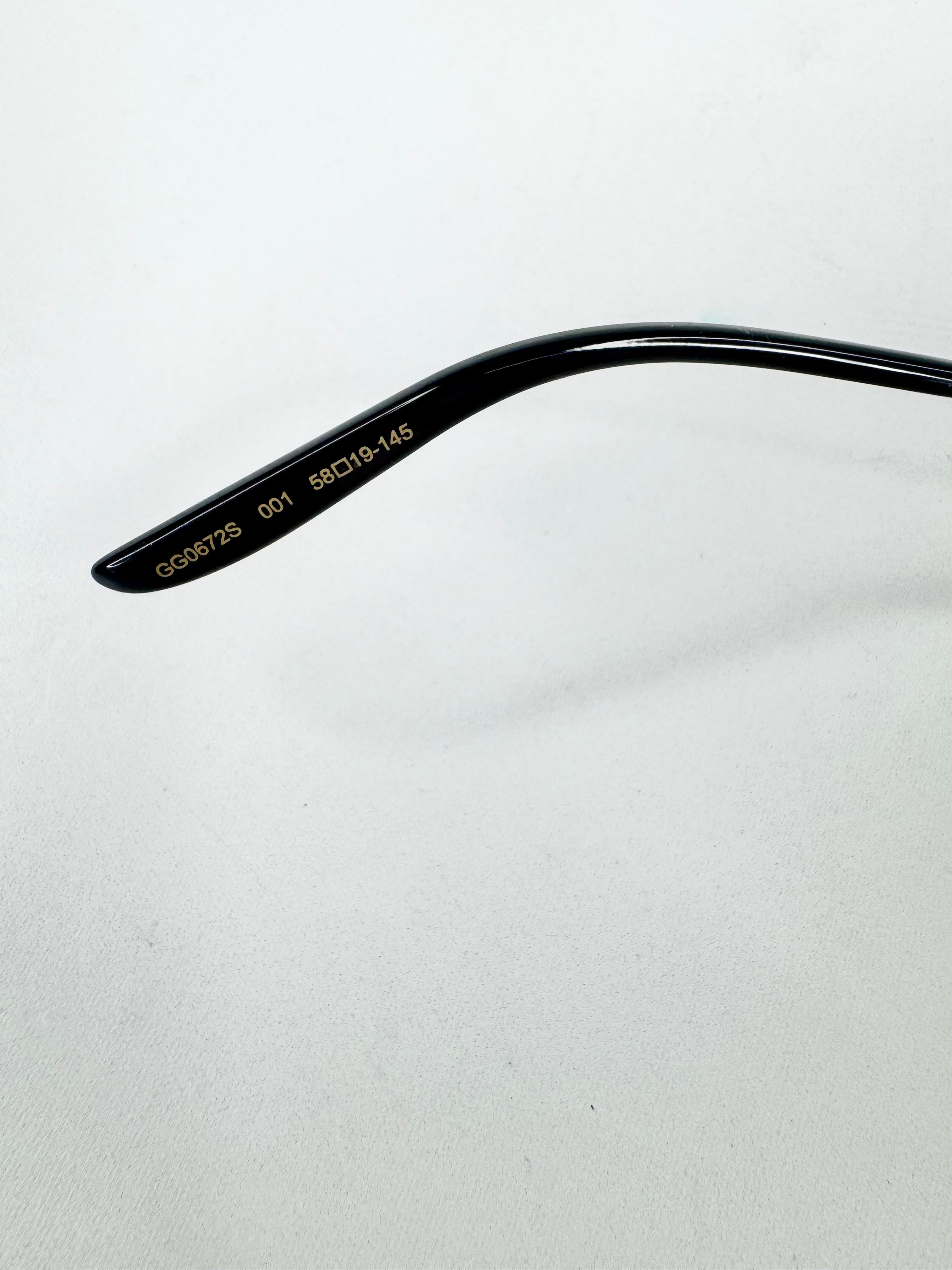 Gucci GG0672S Black & Gold Aviator Sunglasses