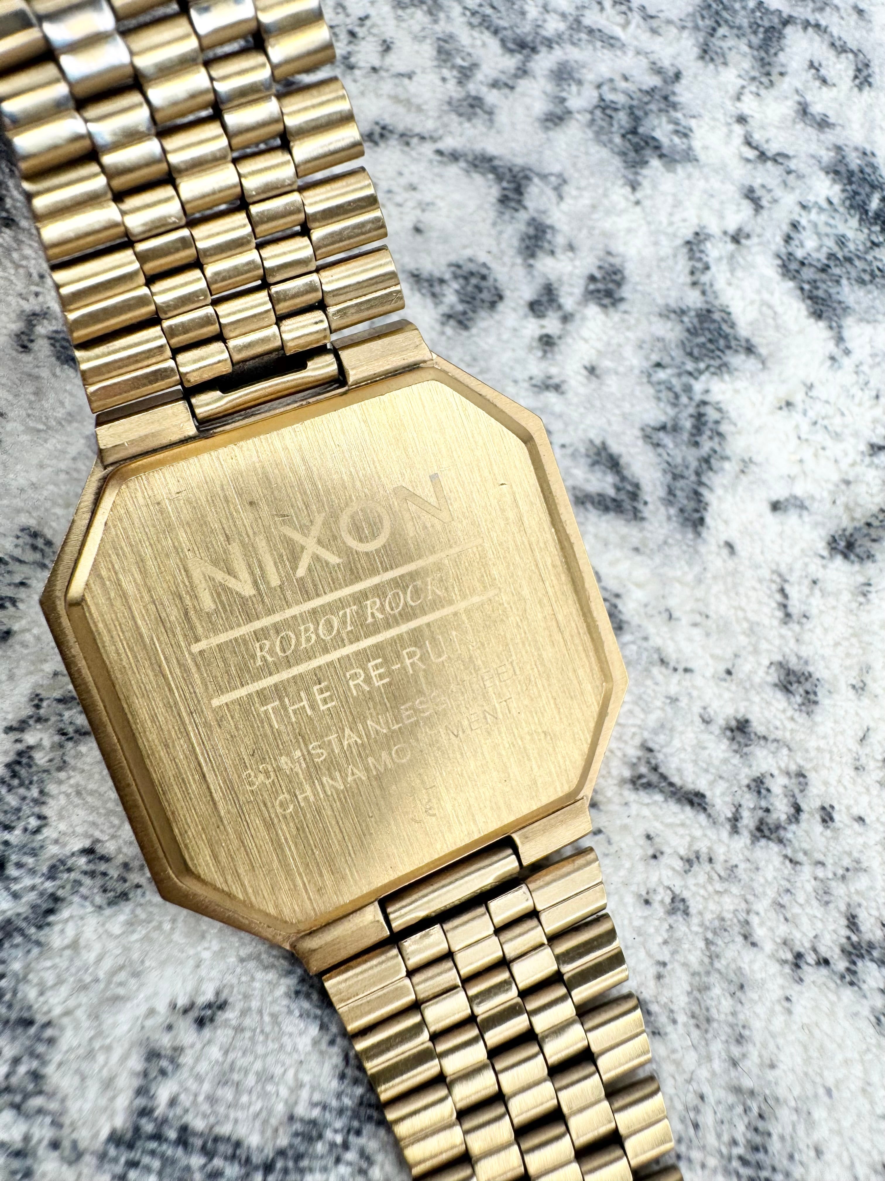 Nixon Gold Tone Black Face & Screen Robot Rock 'The Re-Run' Watch