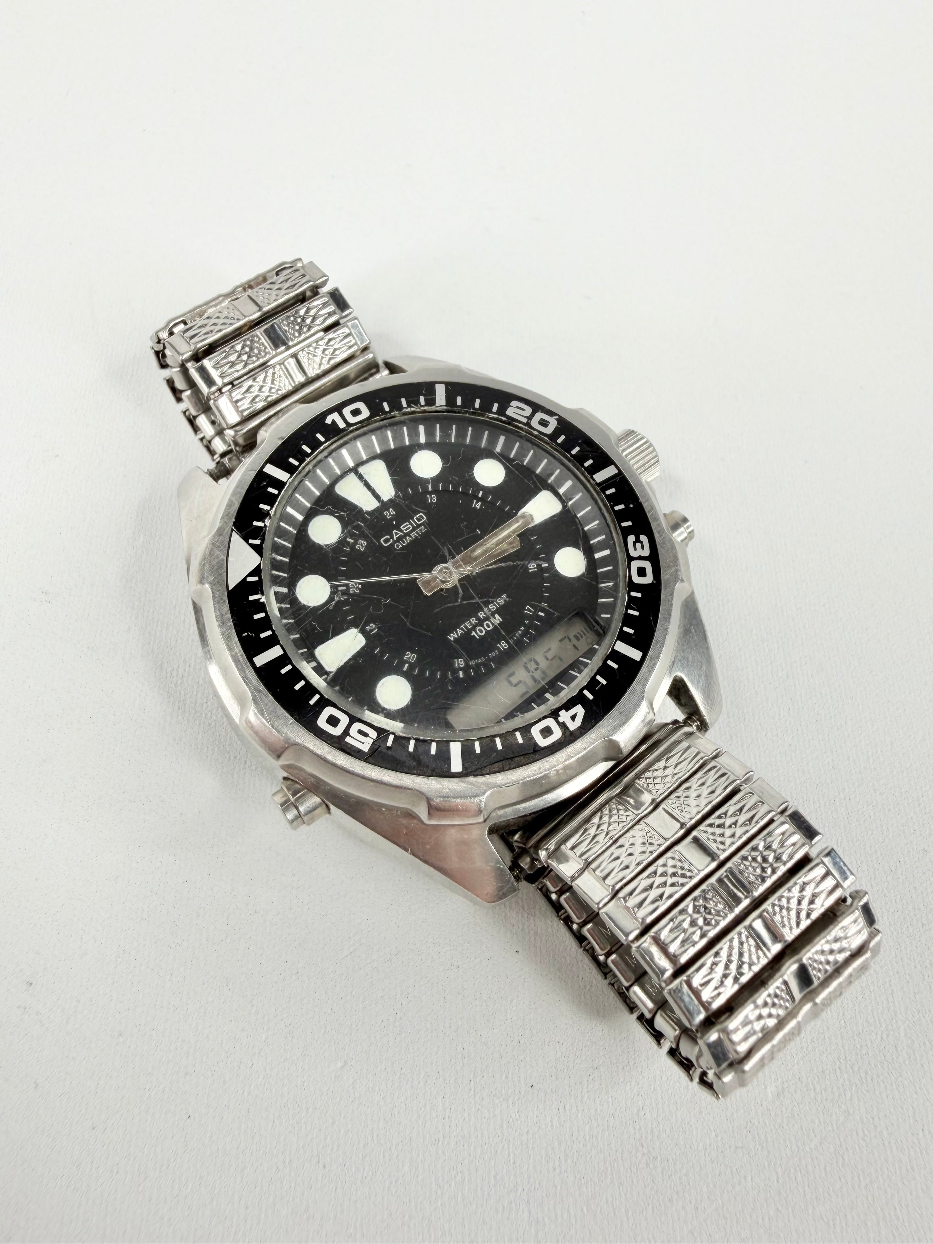 Vintage Casio Silver AQ-600W Ana-Digi Watch