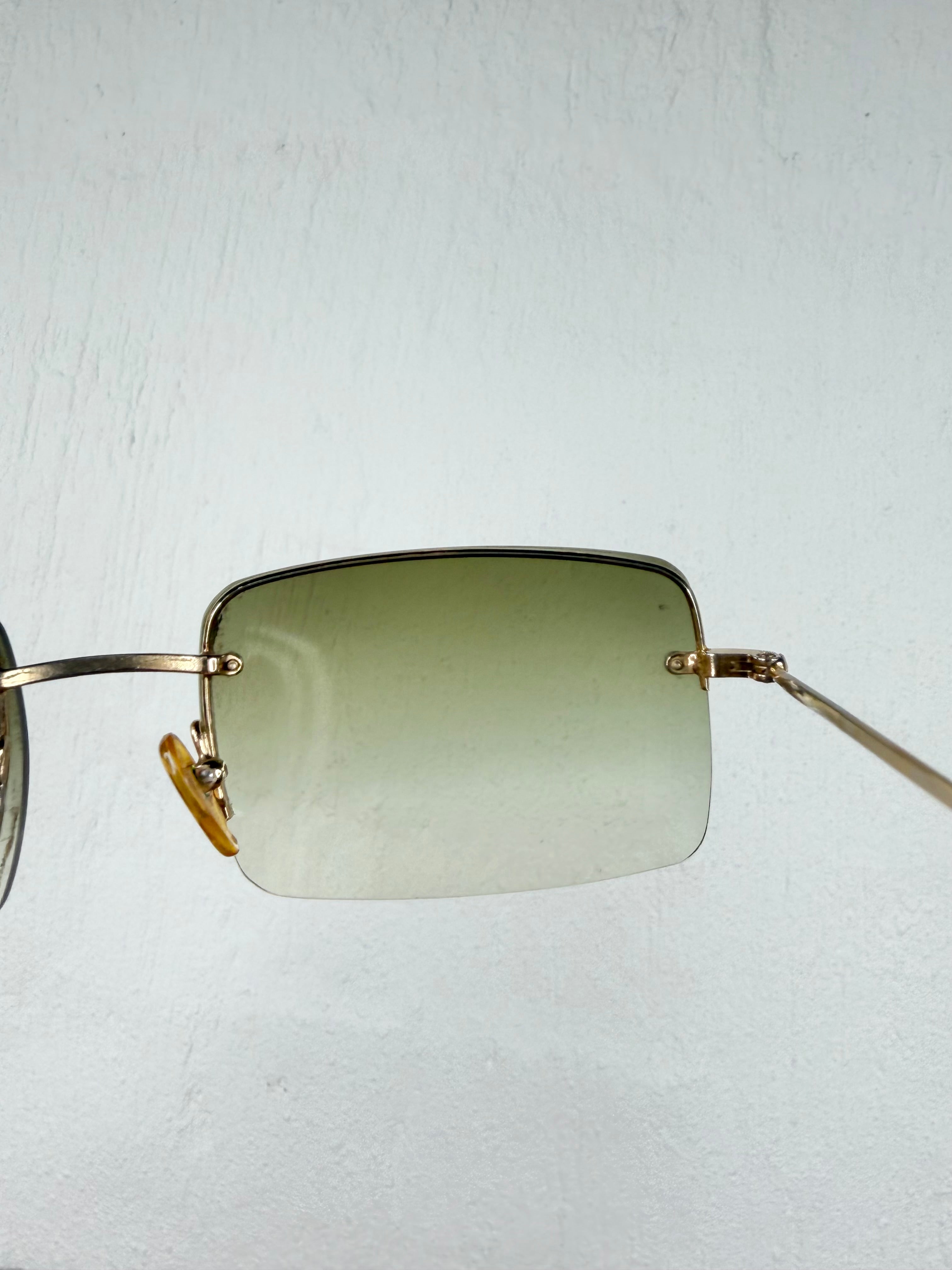 Gucci GG1653/S Gold Rimless Sunglasses