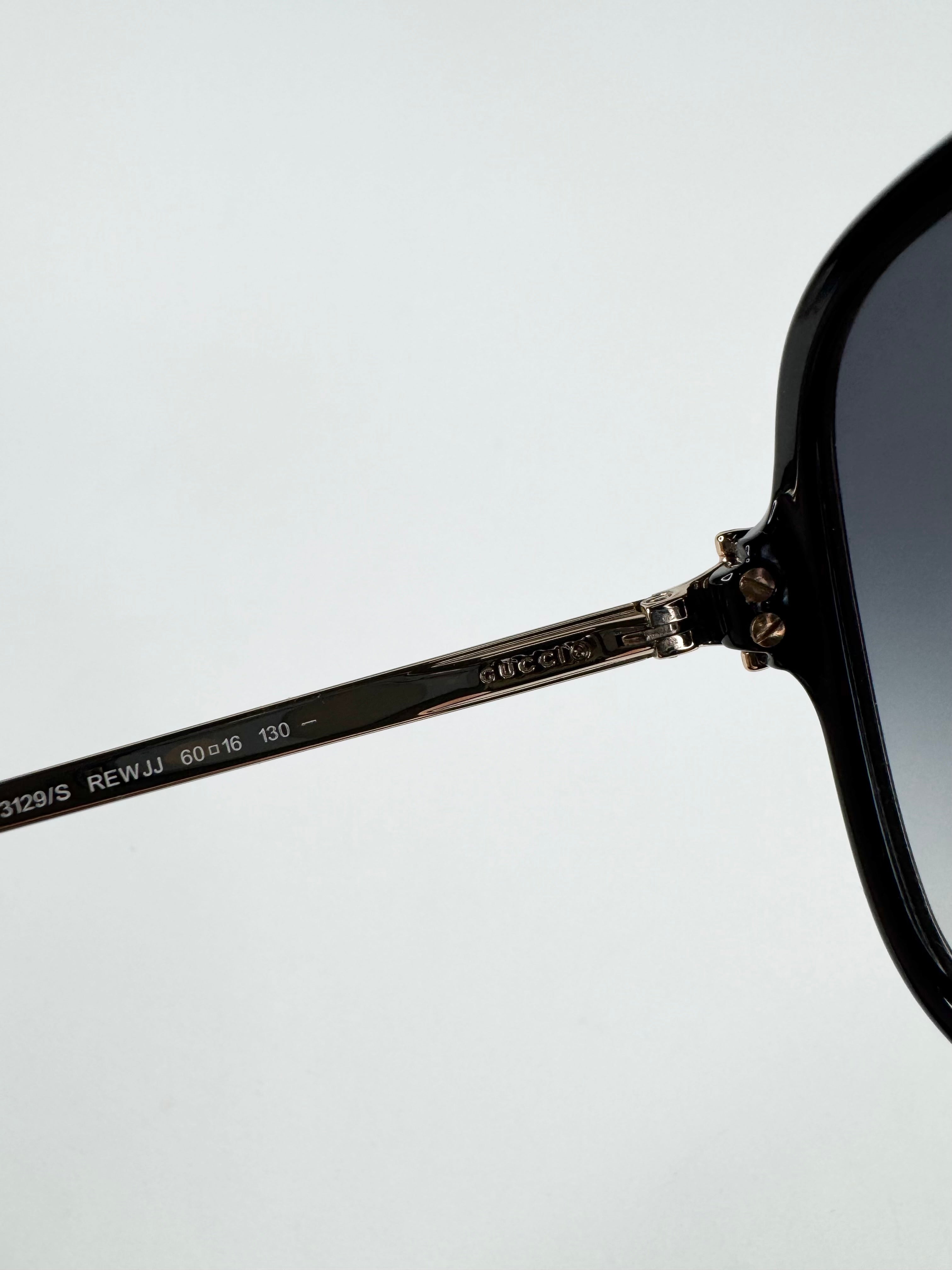 Gucci Black and Gold Round Sunglasses